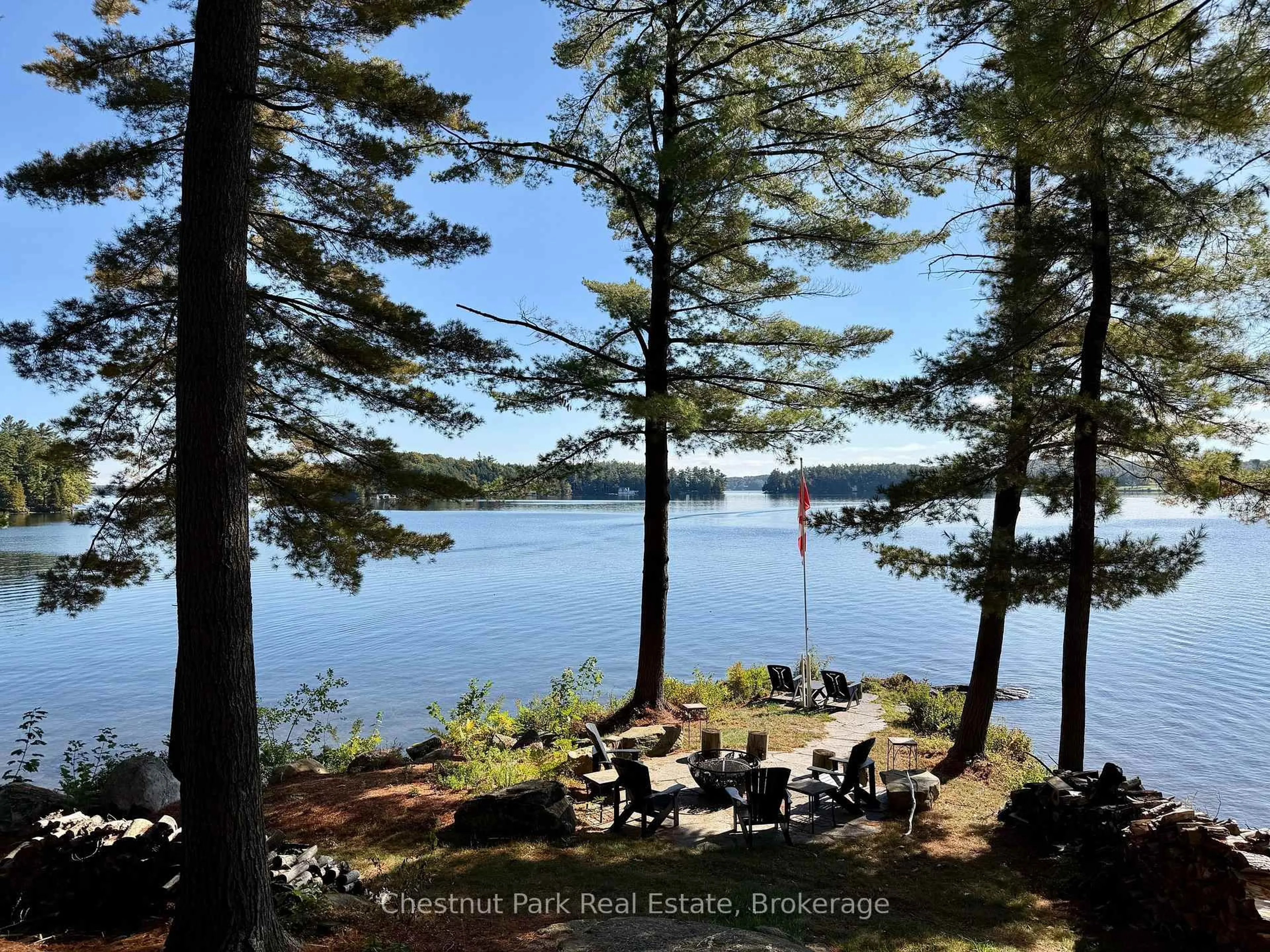 A pic from outside/outdoor area/front of a property/back of a property/a pic from drone, water/lake/river/ocean view for 5 Is Beacon Island, Muskoka Lakes Ontario P0B 1J0