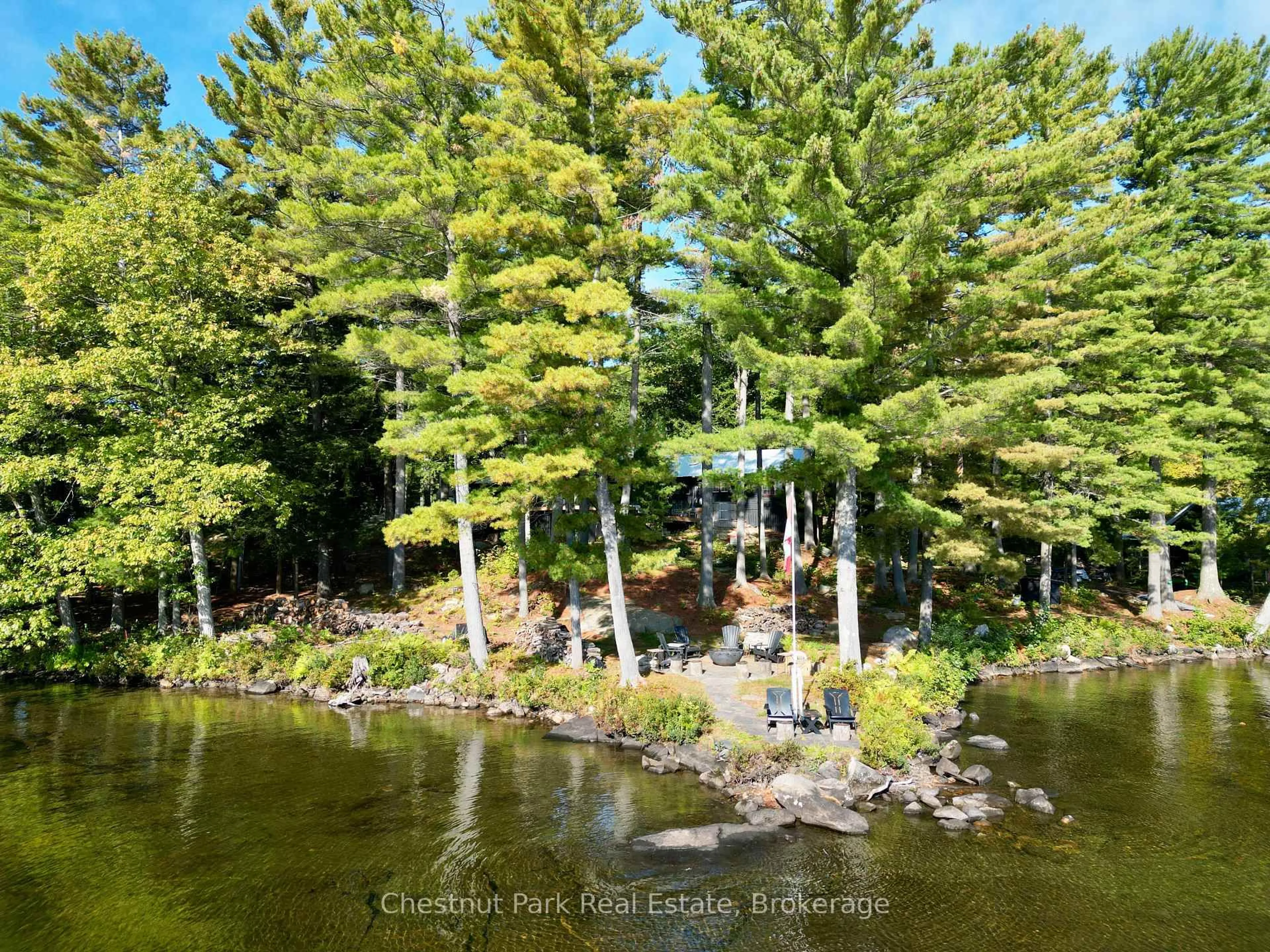 A pic from outside/outdoor area/front of a property/back of a property/a pic from drone, forest/trees view for 5 Is Beacon Island, Muskoka Lakes Ontario P0B 1J0