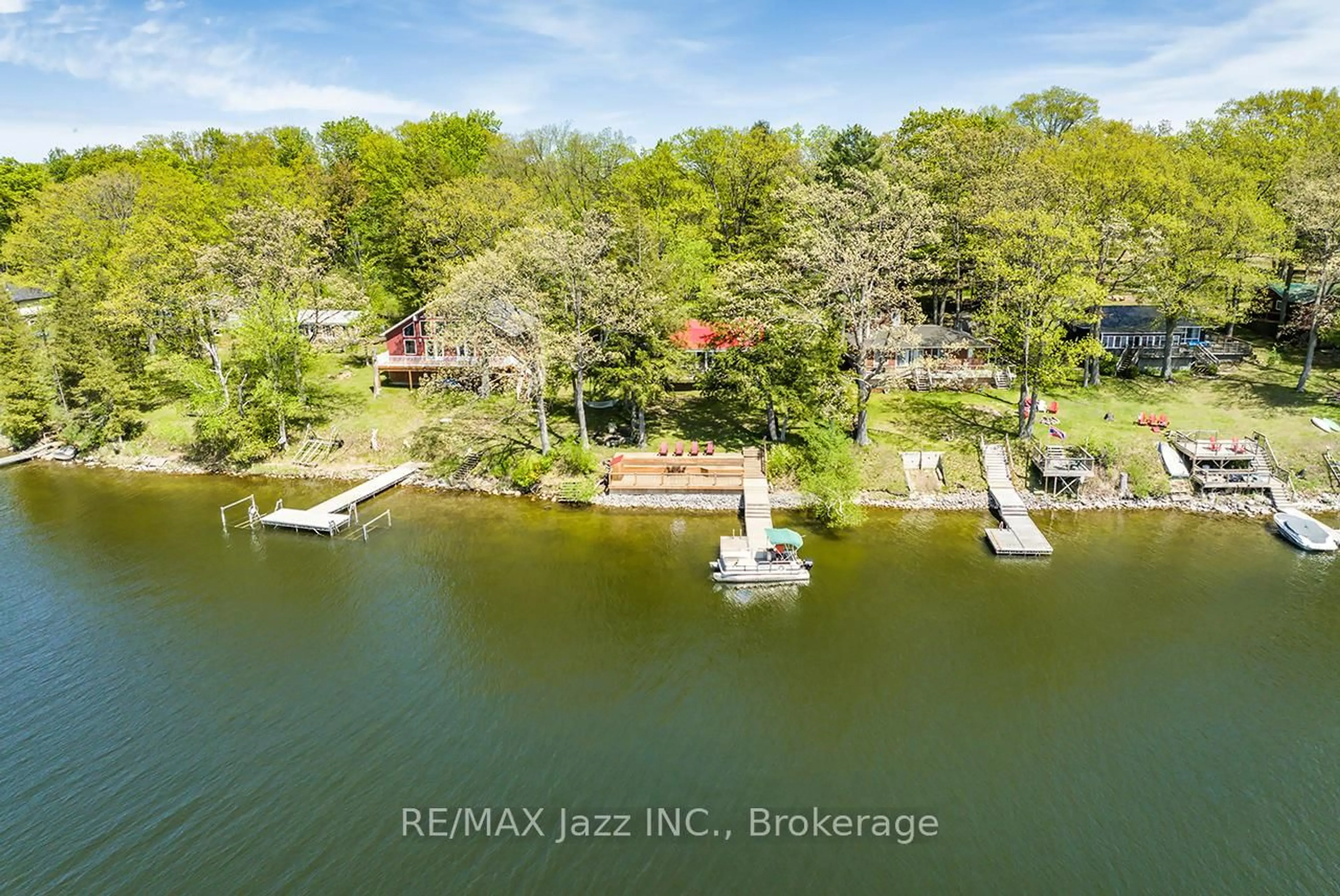 A pic from outside/outdoor area/front of a property/back of a property/a pic from drone, water/lake/river/ocean view for 31 Long Island, Otonabee-South Monaghan Ontario K0K 2E0