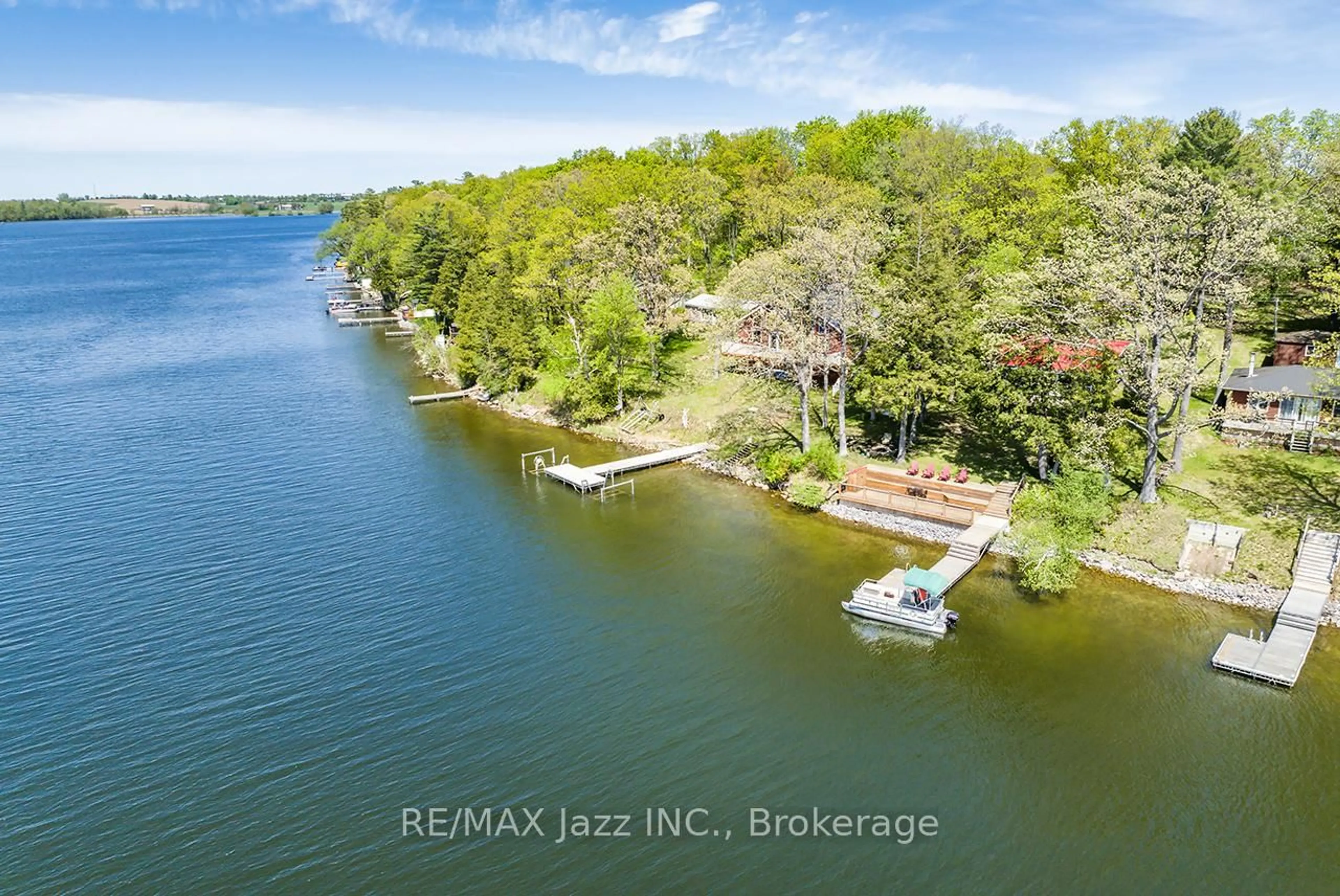 A pic from outside/outdoor area/front of a property/back of a property/a pic from drone, water/lake/river/ocean view for 31 Long Island, Otonabee-South Monaghan Ontario K0K 2E0