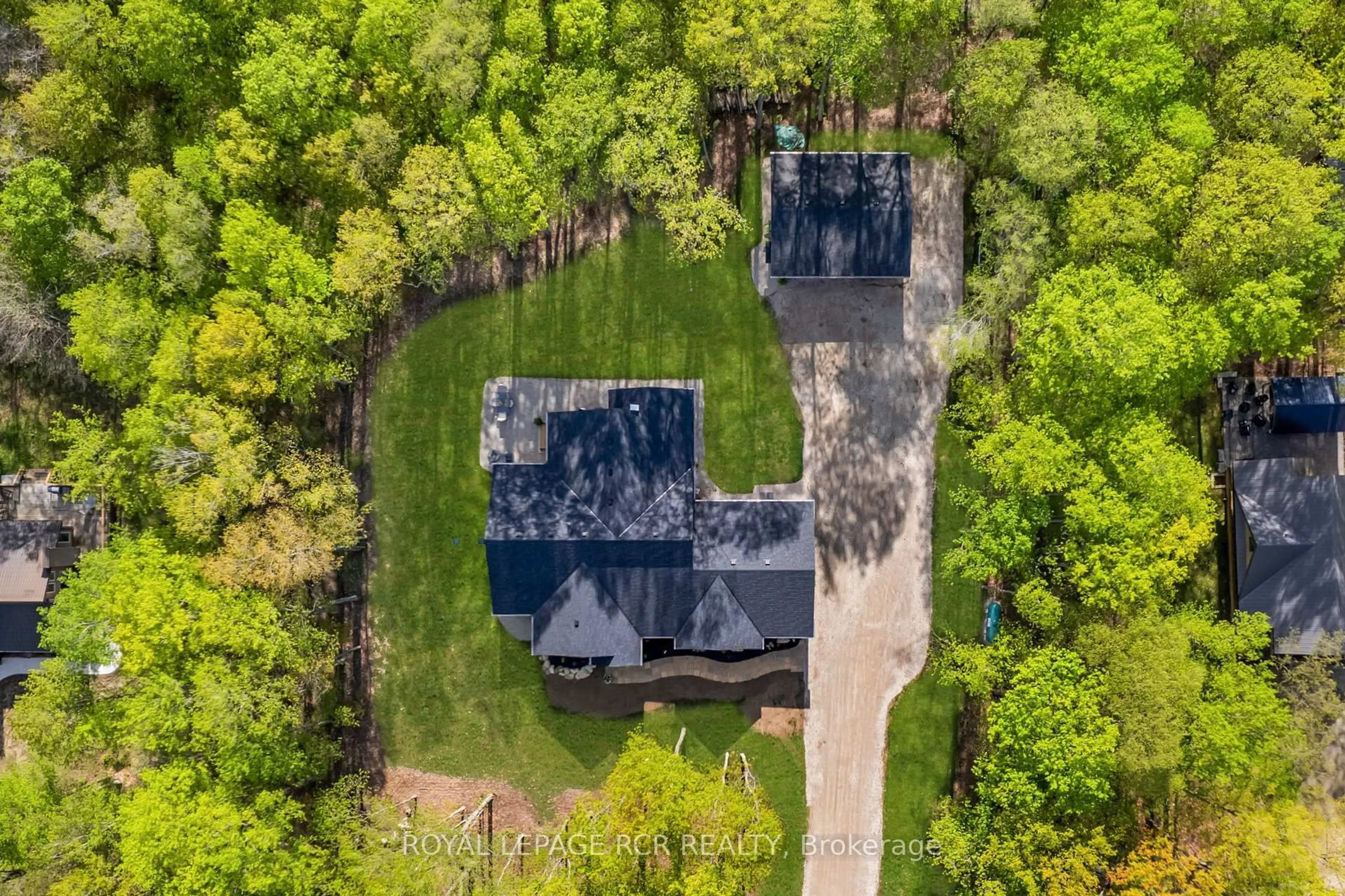 A pic from outside/outdoor area/front of a property/back of a property/a pic from drone, forest/trees view for 110 Beau Lane, Grey Highlands Ontario N0C 1E0