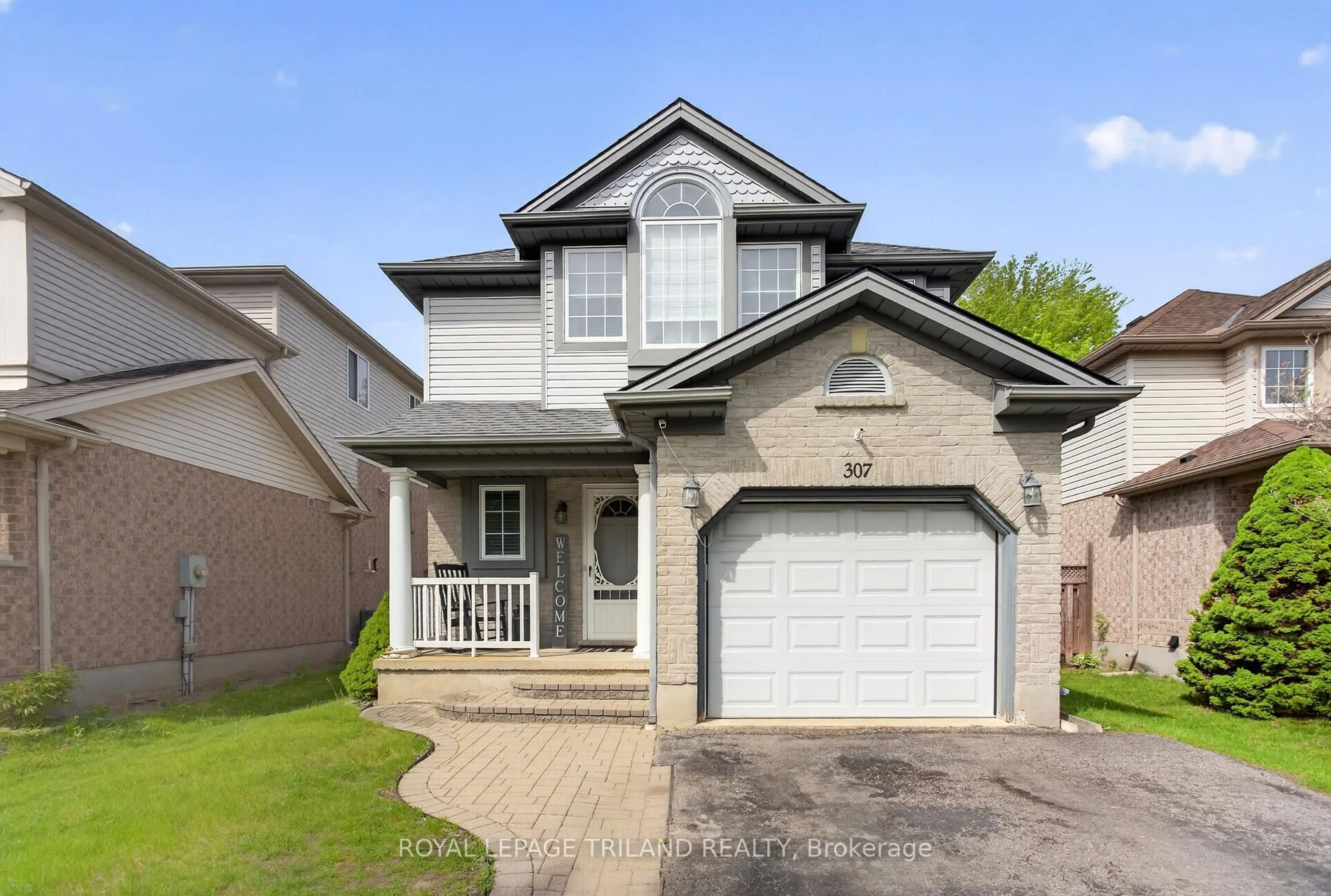 Home with vinyl exterior material, street for 307 Jensen Rd, London East Ontario N5V 4X3