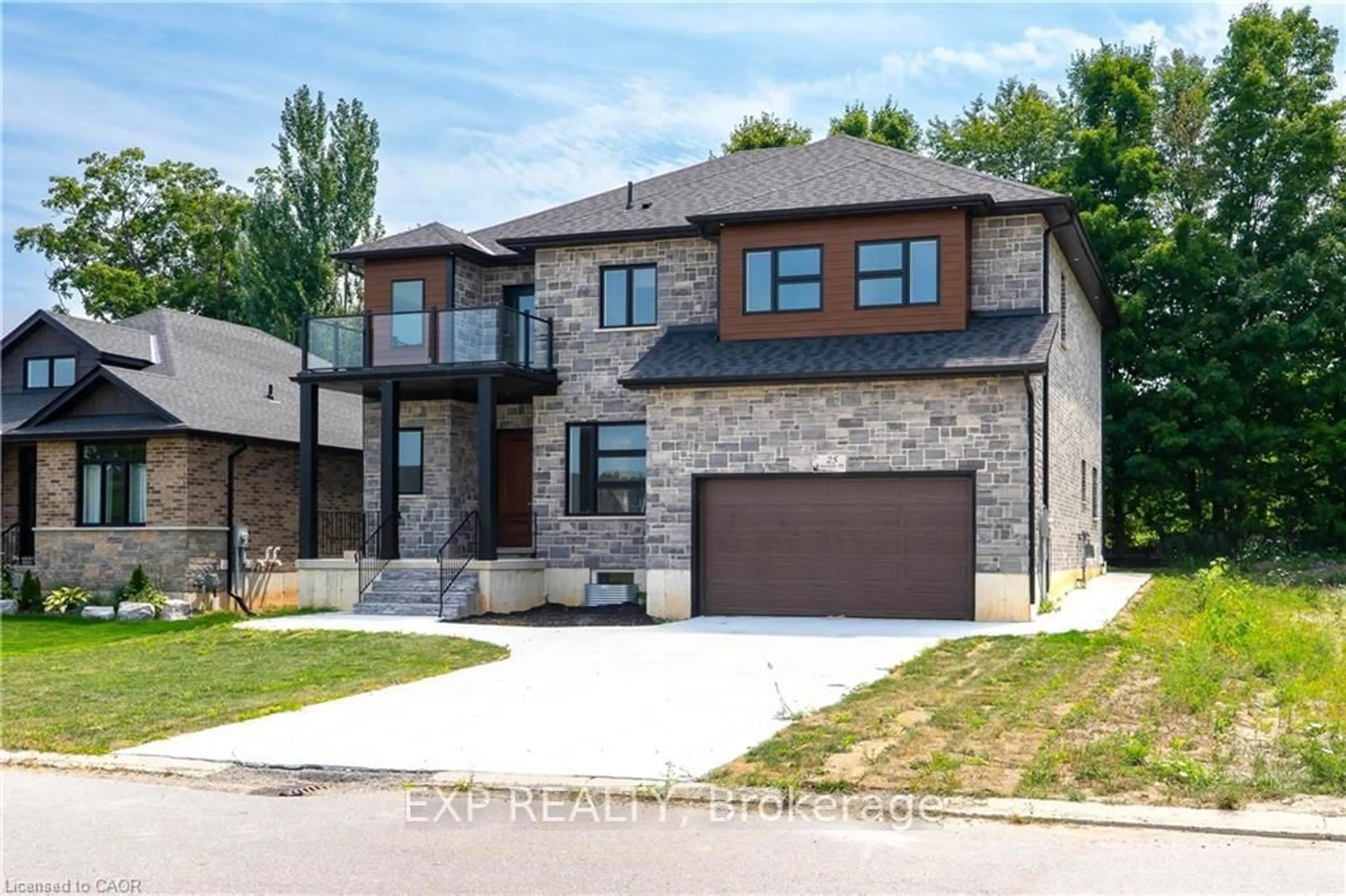 Home with brick exterior material, street for 25 Sunview Dr, Norwich Ontario N0J 1P0