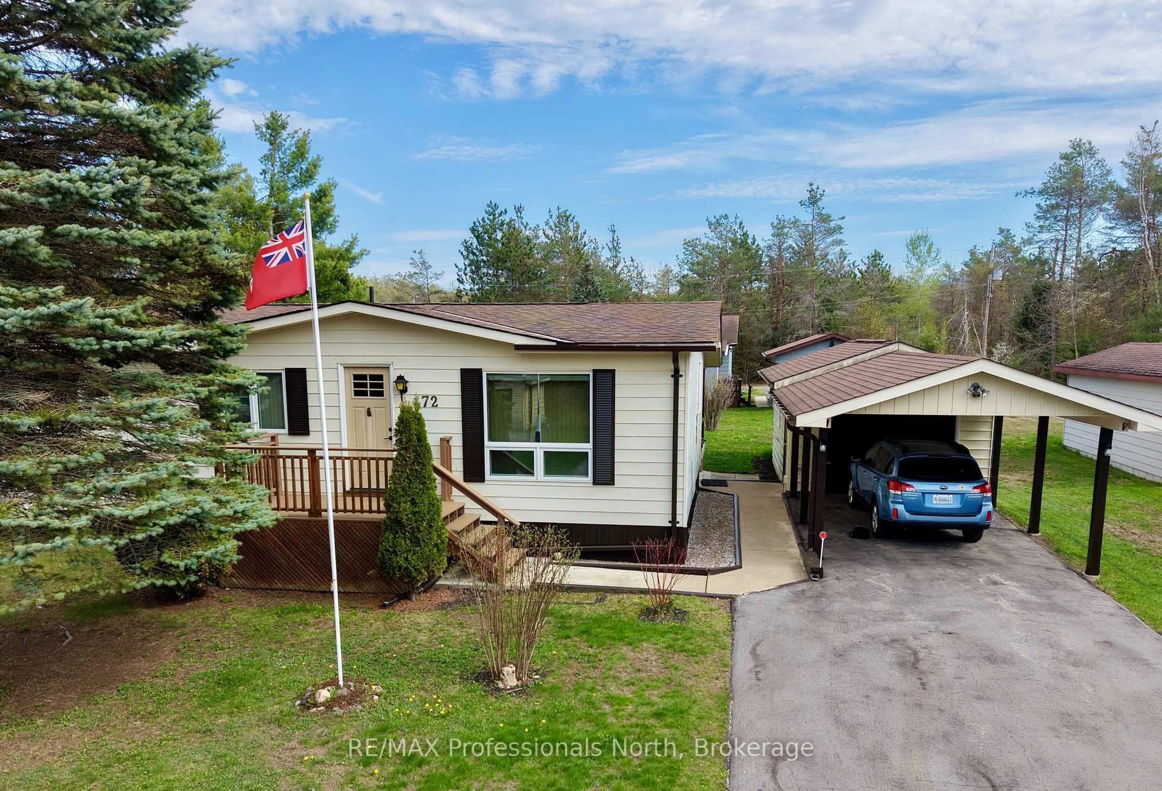 A pic from outside/outdoor area/front of a property/back of a property/a pic from drone, street for 1094 Seventh Lane, Minden Hills Ontario K0M 2K0