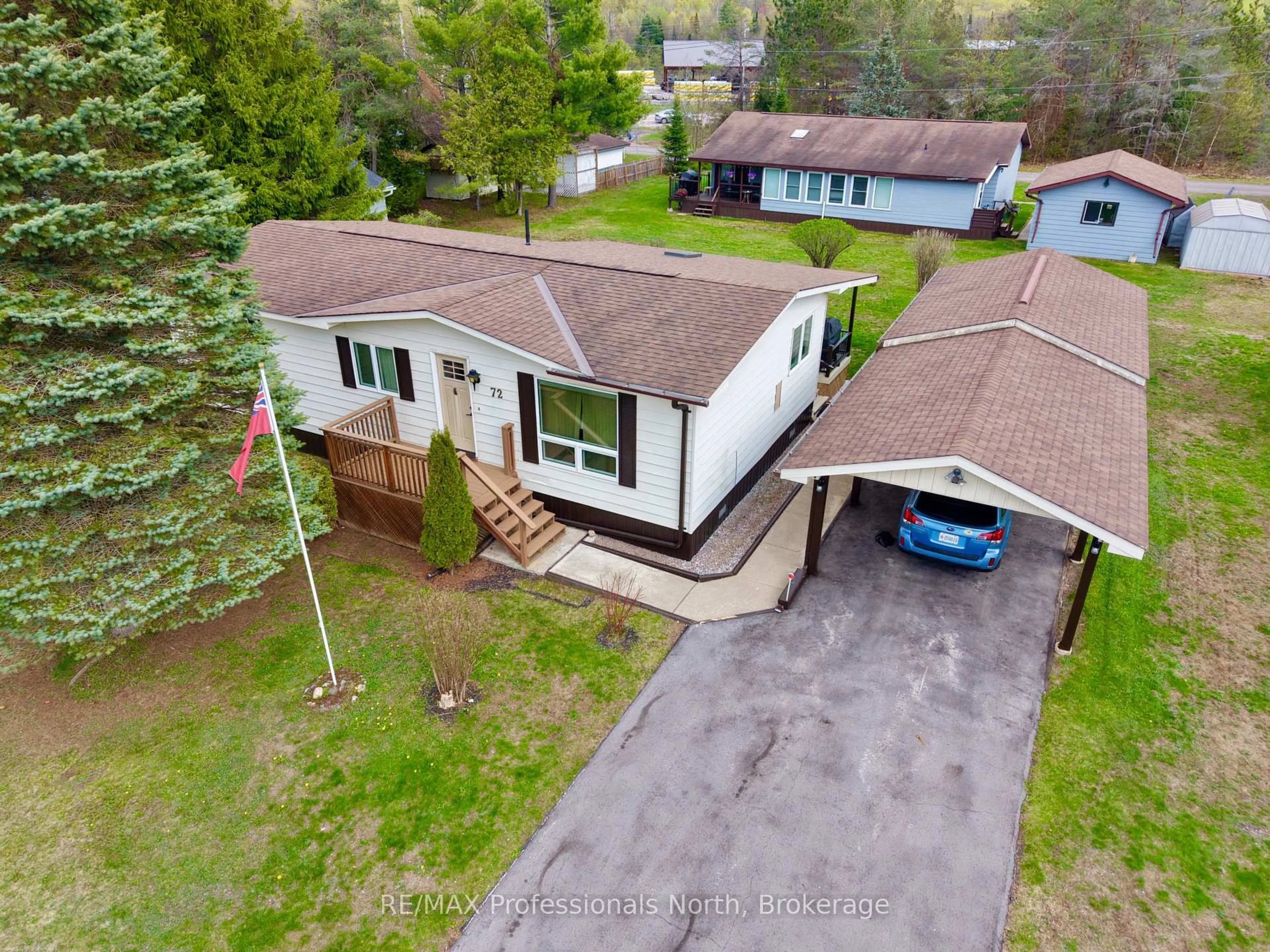 A pic from outside/outdoor area/front of a property/back of a property/a pic from drone, street for 1094 Seventh Lane, Minden Hills Ontario K0M 2K0