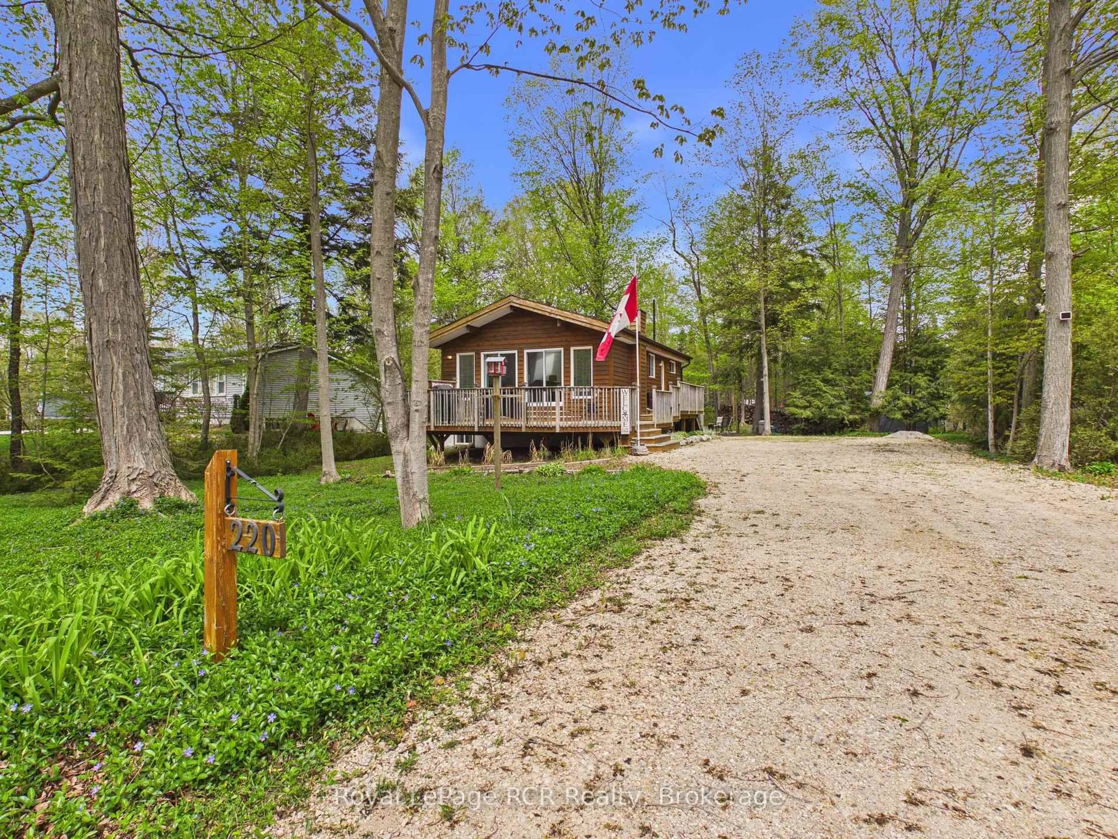 A pic from outside/outdoor area/front of a property/back of a property/a pic from drone, water/lake/river/ocean view for 220 Shadywood Cres, Huron-Kinloss Ontario N2Z 2X3