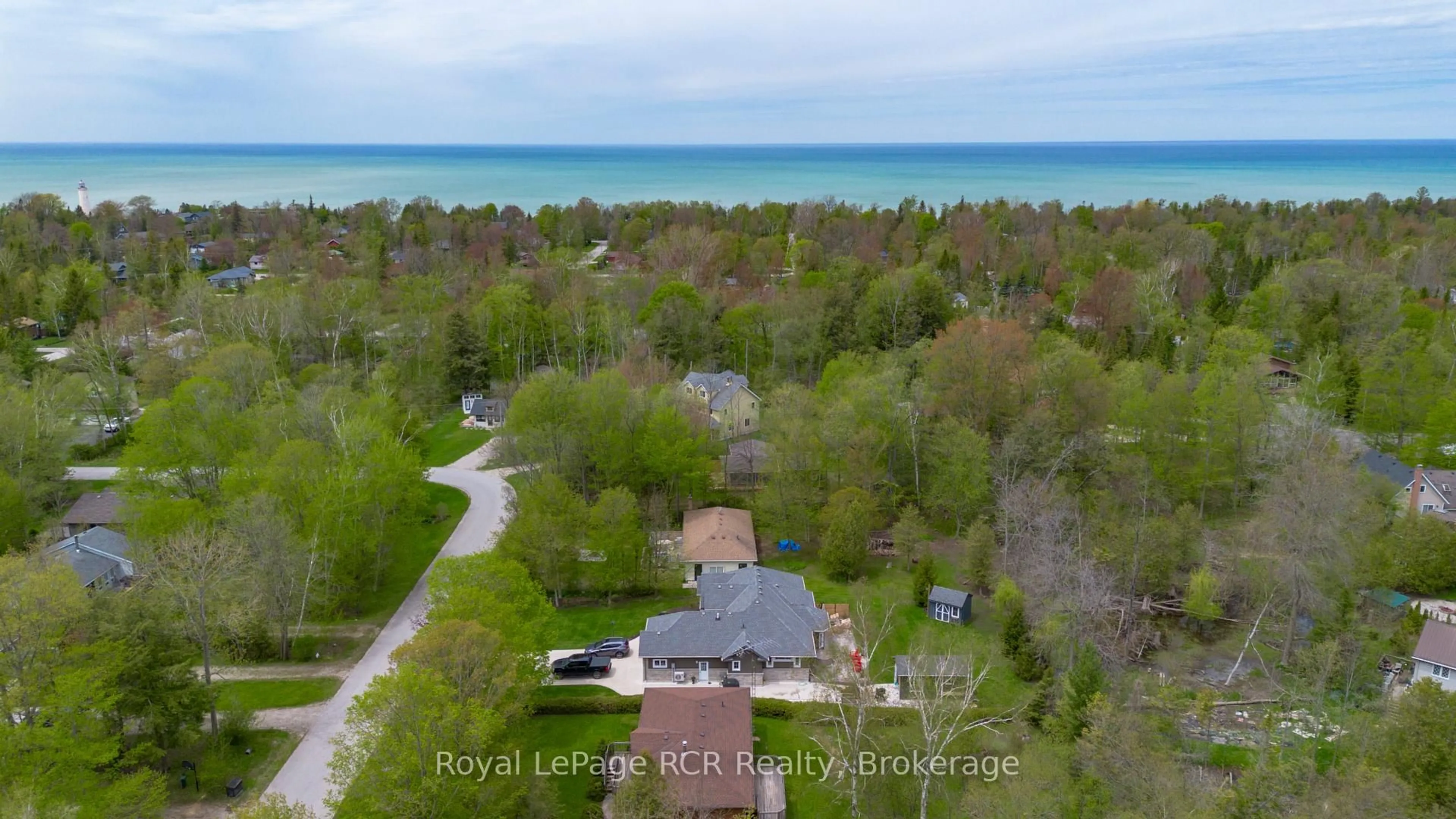 A pic from outside/outdoor area/front of a property/back of a property/a pic from drone, water/lake/river/ocean view for 220 Shadywood Cres, Huron-Kinloss Ontario N2Z 2X3