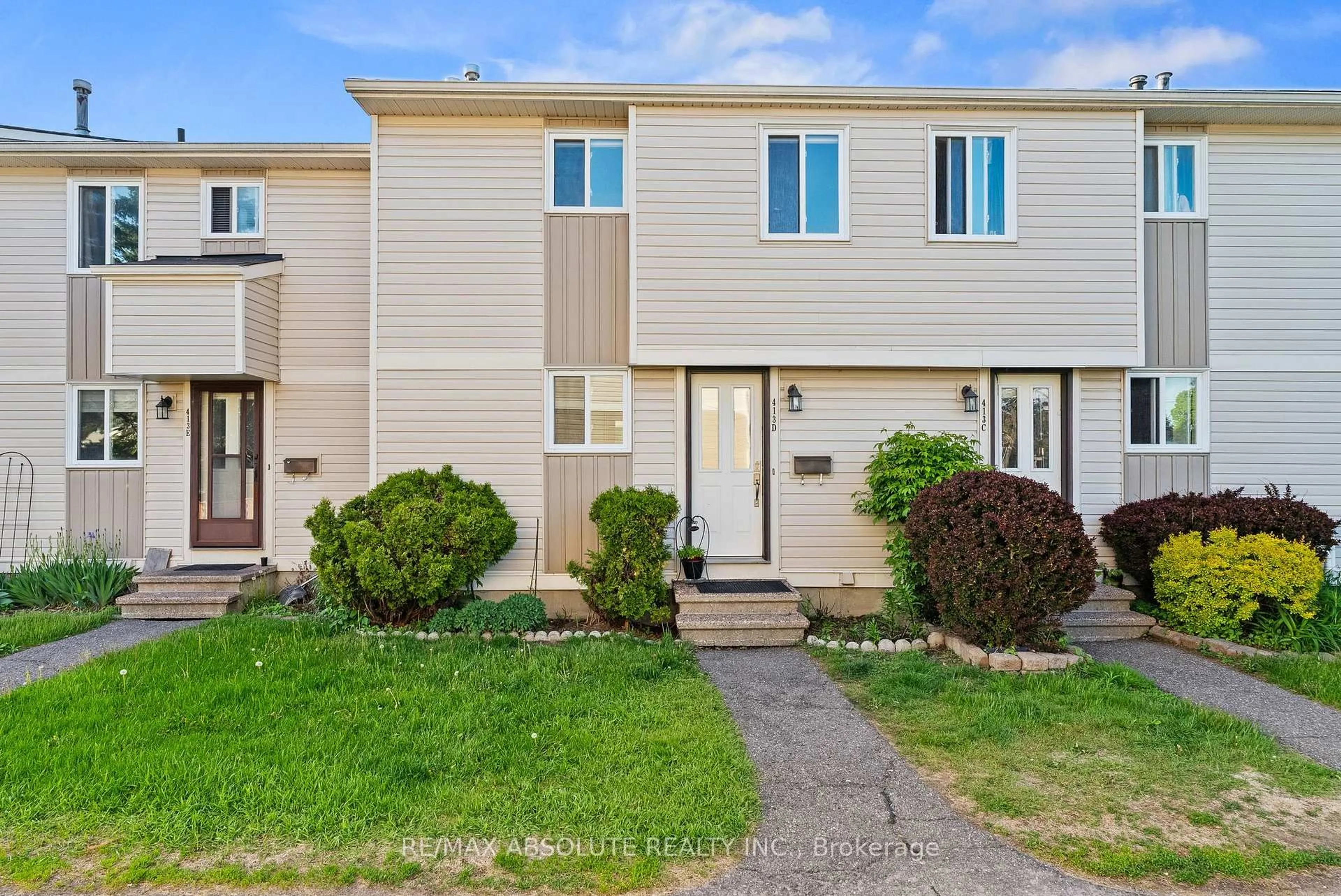 Home with vinyl exterior material, street for 413 Woodfield Dr ##D, Ottawa Ontario K2G 4B7