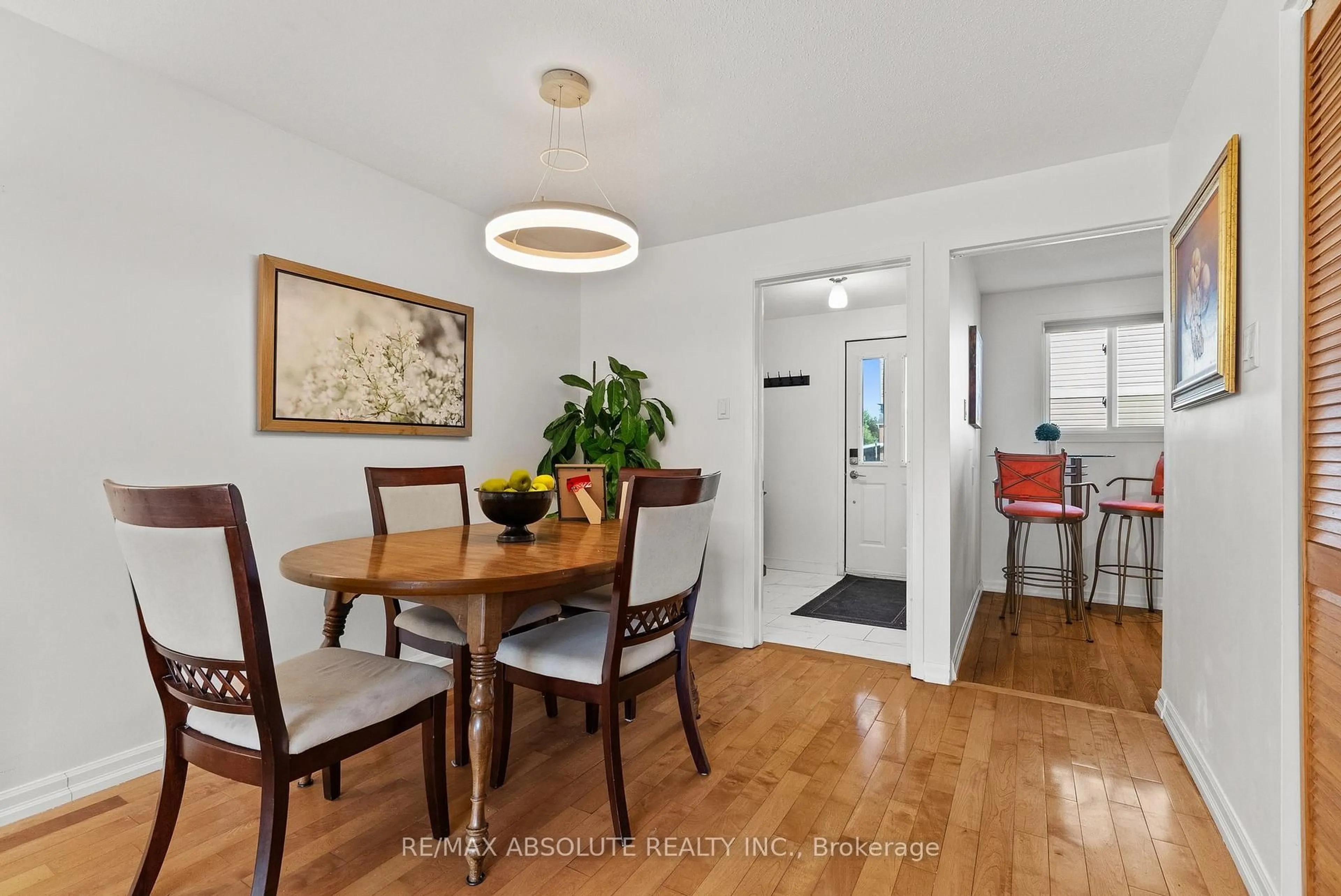 Dining room, wood/laminate floor for 413 Woodfield Dr ##D, Ottawa Ontario K2G 4B7