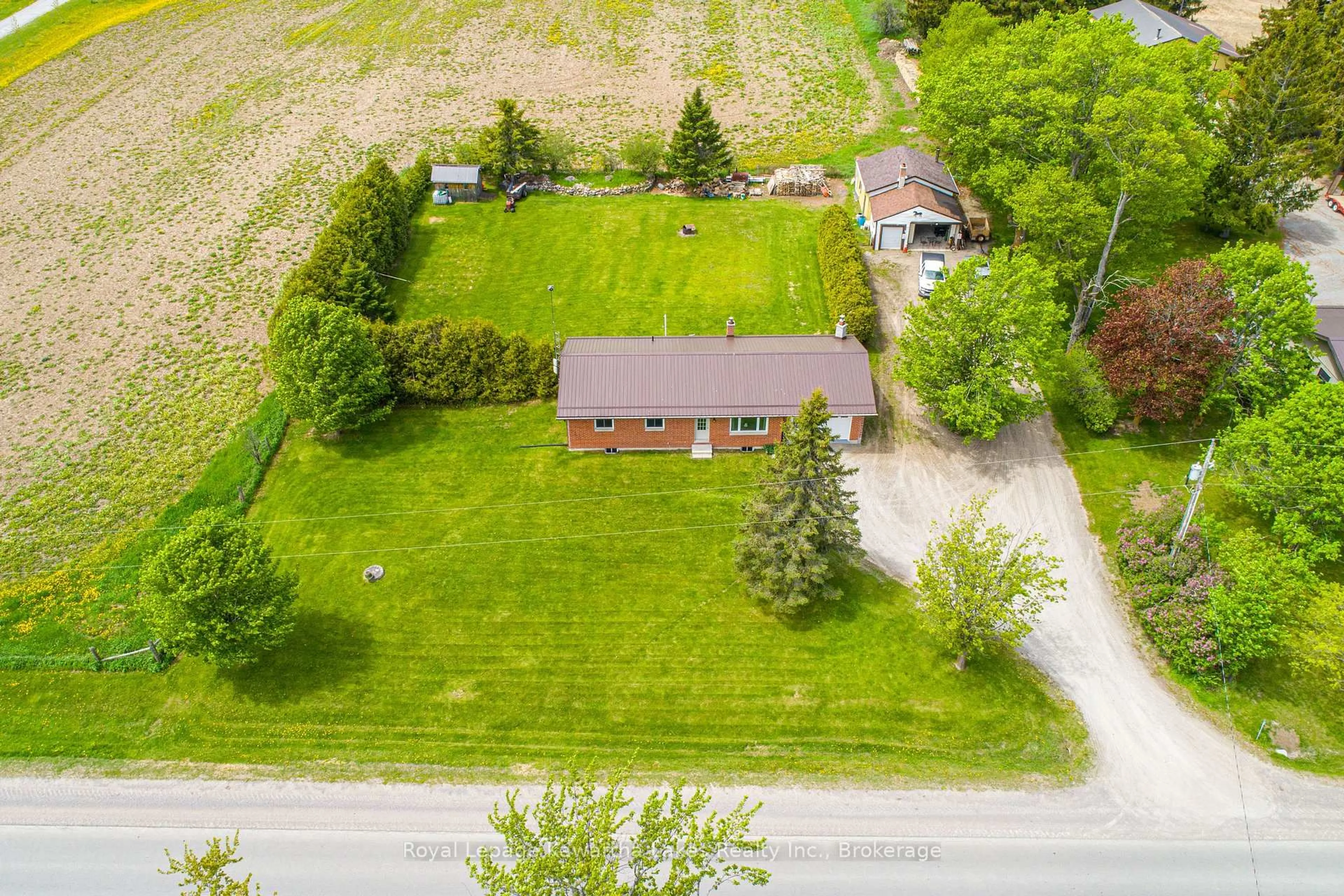 A pic from outside/outdoor area/front of a property/back of a property/a pic from drone, street for 1343 Elm Tree Rd, Kawartha Lakes Ontario K9V 4R2