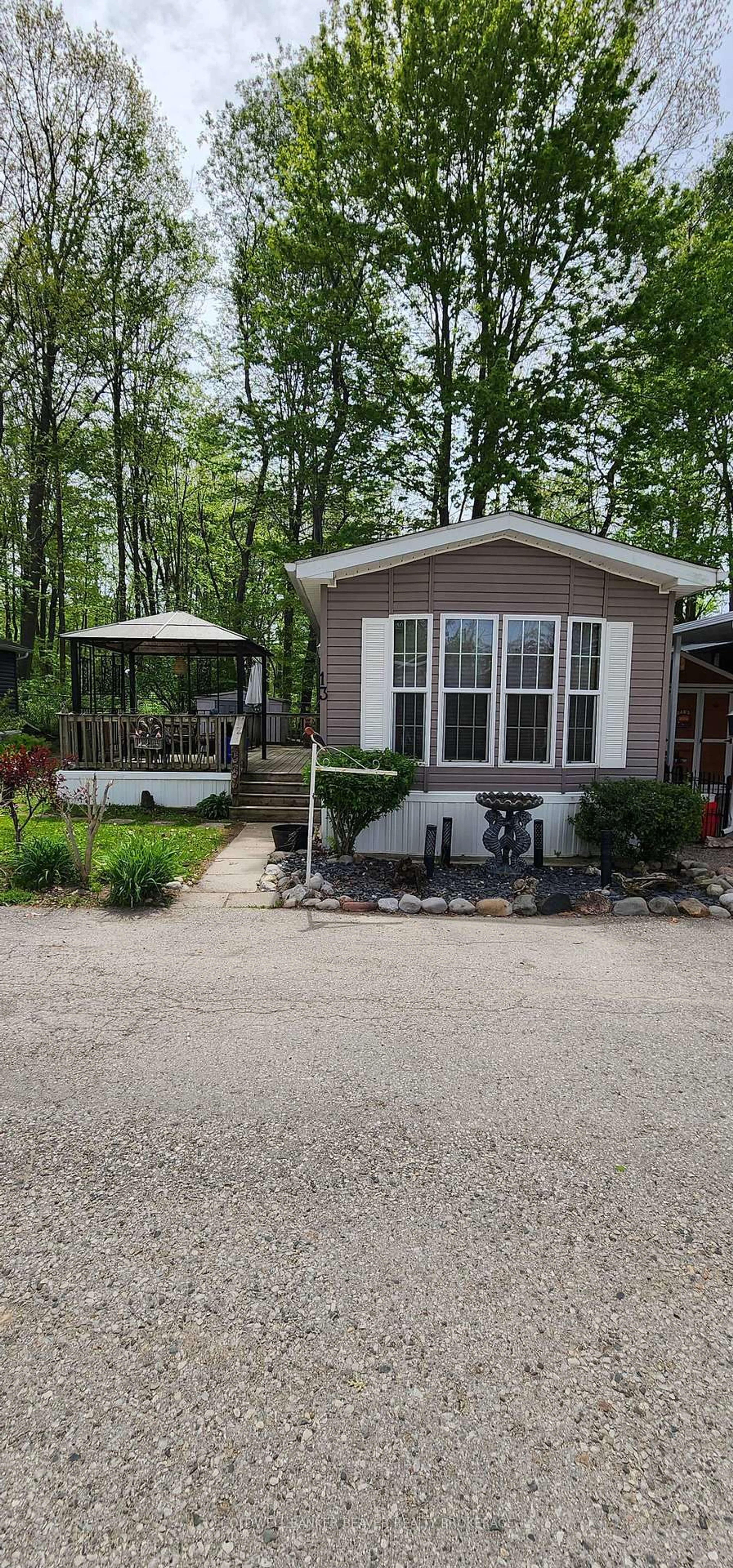 Home with vinyl exterior material, street for 22790 Amiens Rd #13, Middlesex Centre Ontario N0L 1R0