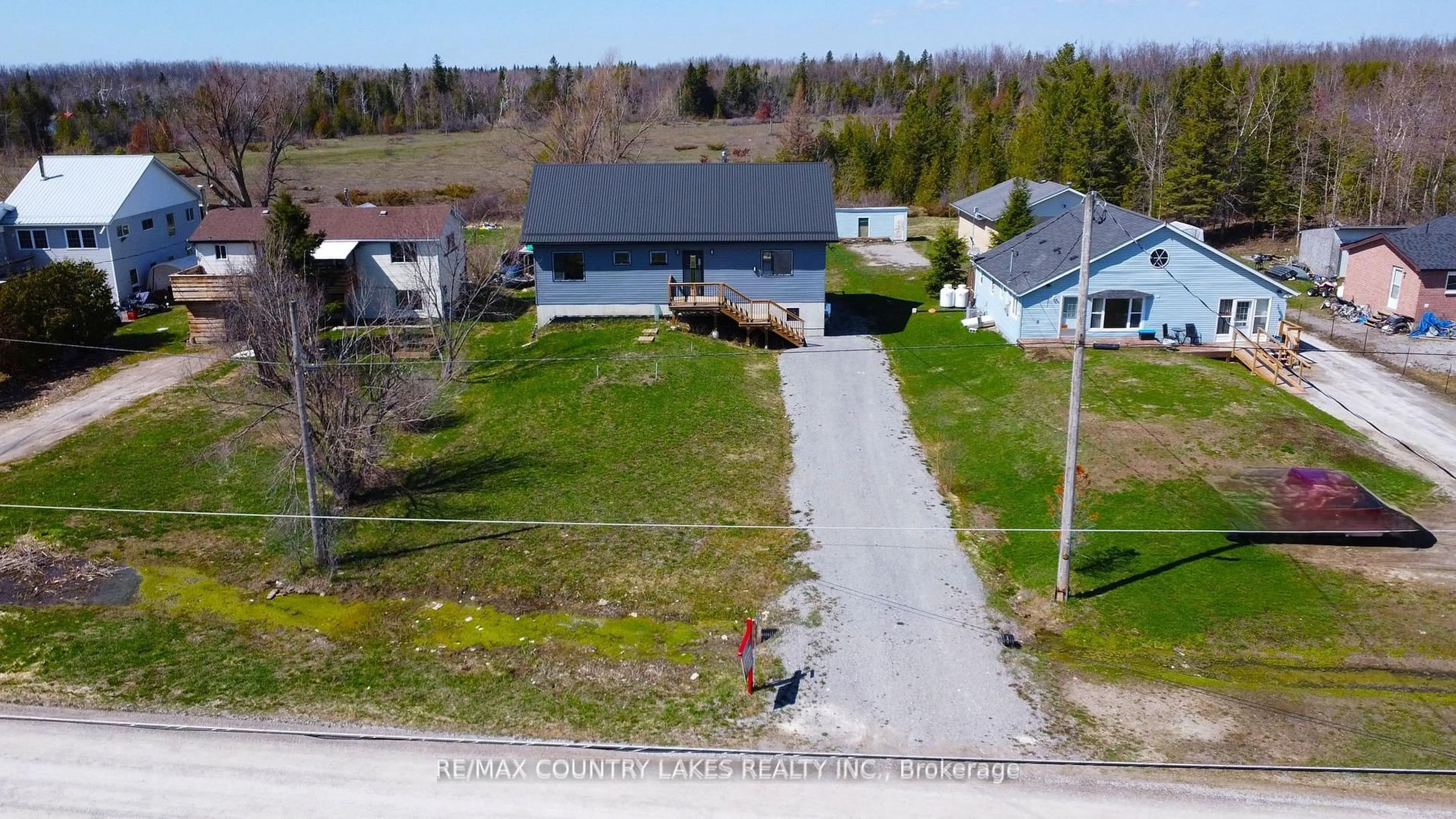 A pic from outside/outdoor area/front of a property/back of a property/a pic from drone, street for 264 Mcguire Beach Rd, Kawartha Lakes Ontario K0M 2B0