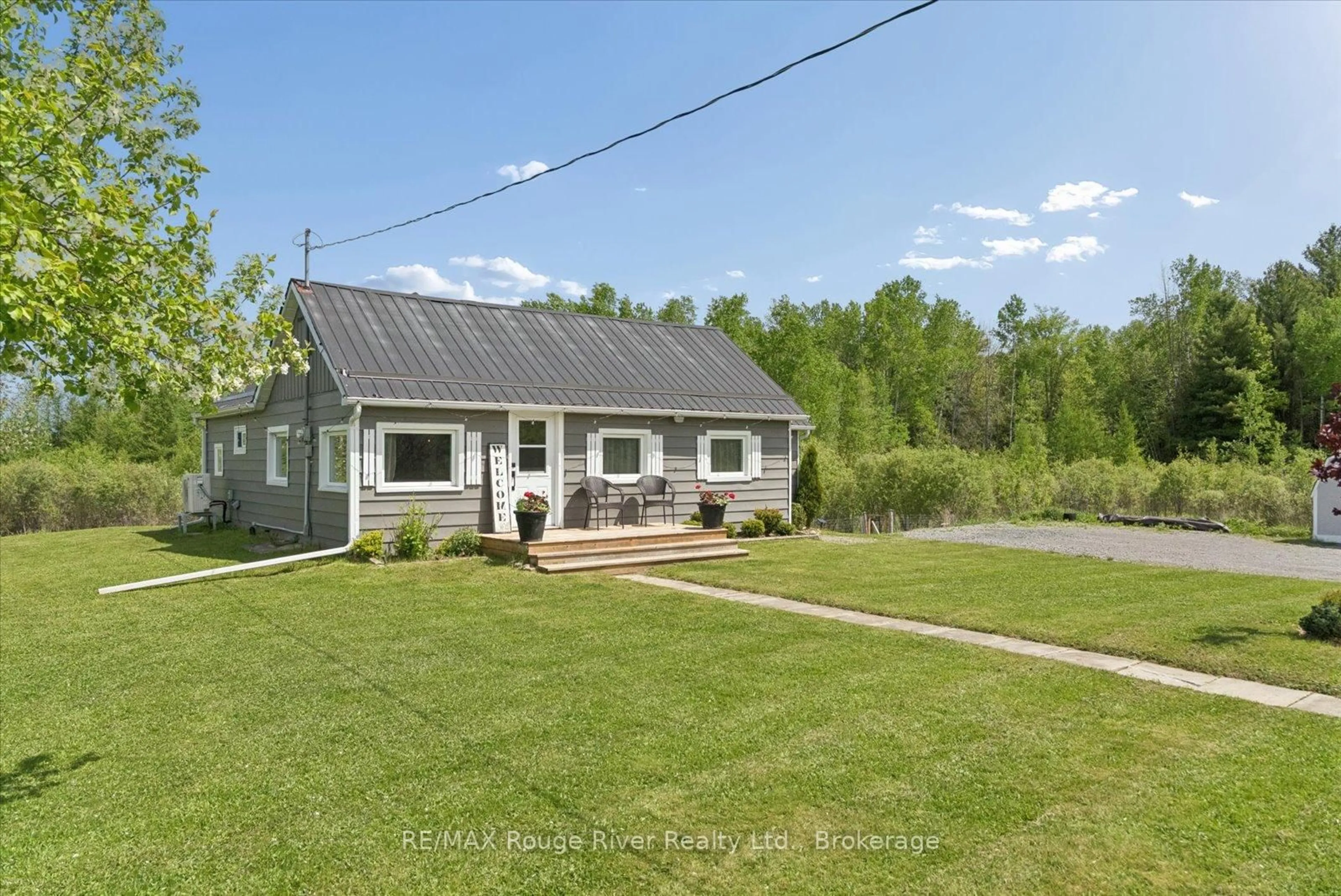 A pic from outside/outdoor area/front of a property/back of a property/a pic from drone, street for 312 Boyd Rd, Limoges Ontario K0K 2M0