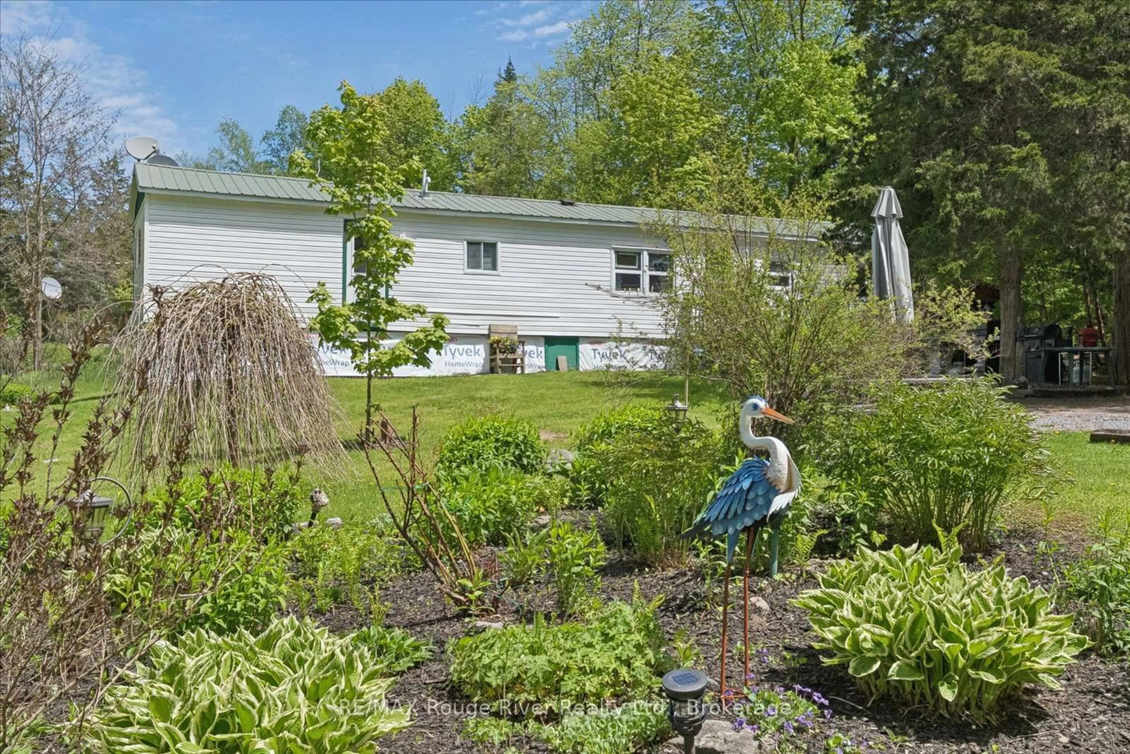 A pic from outside/outdoor area/front of a property/back of a property/a pic from drone, water/lake/river/ocean view for 189 Pine Lane, Trent Hills Ontario K0K 2M0