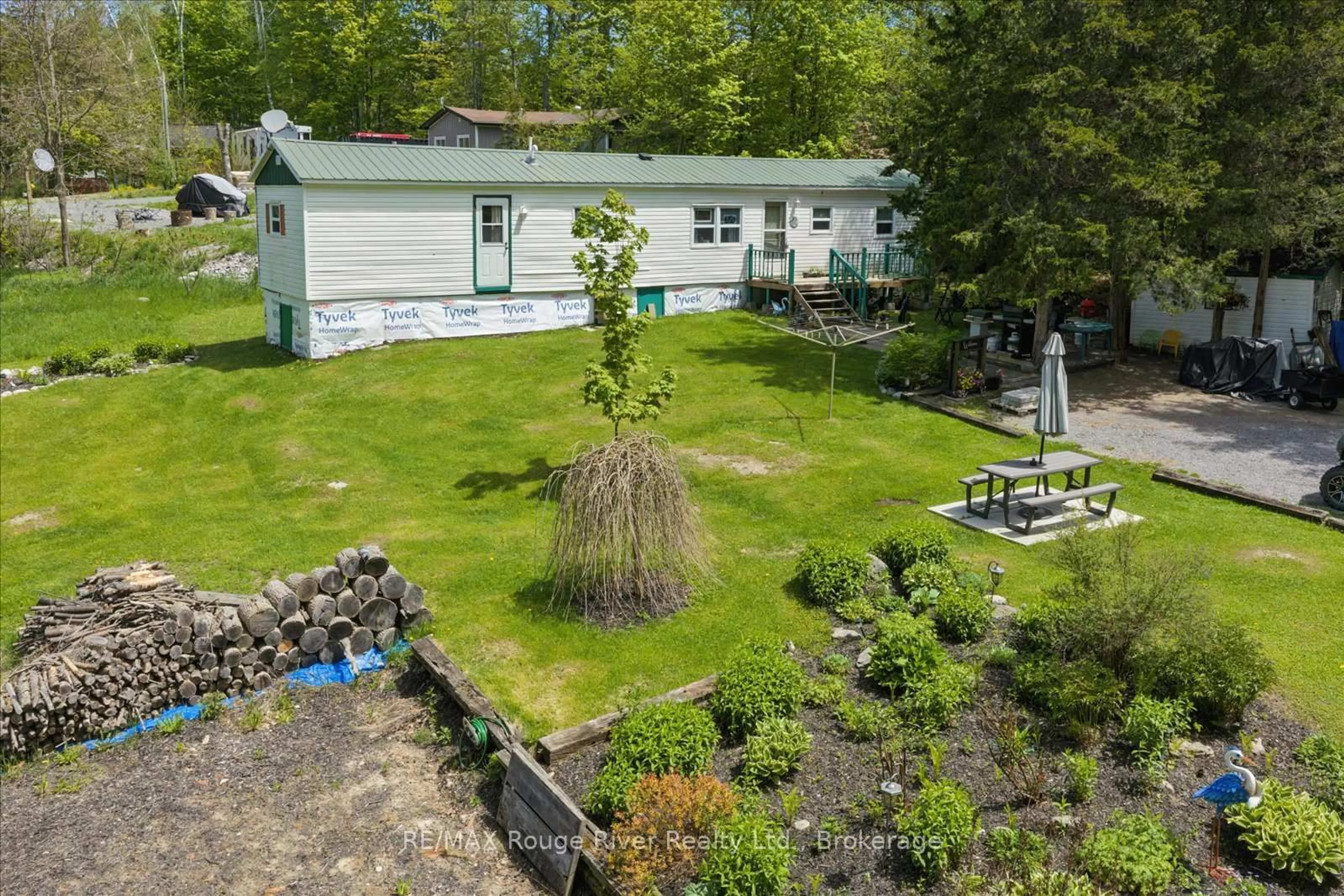 A pic from outside/outdoor area/front of a property/back of a property/a pic from drone, unknown for 189 Pine Lane, Trent Hills Ontario K0K 2M0