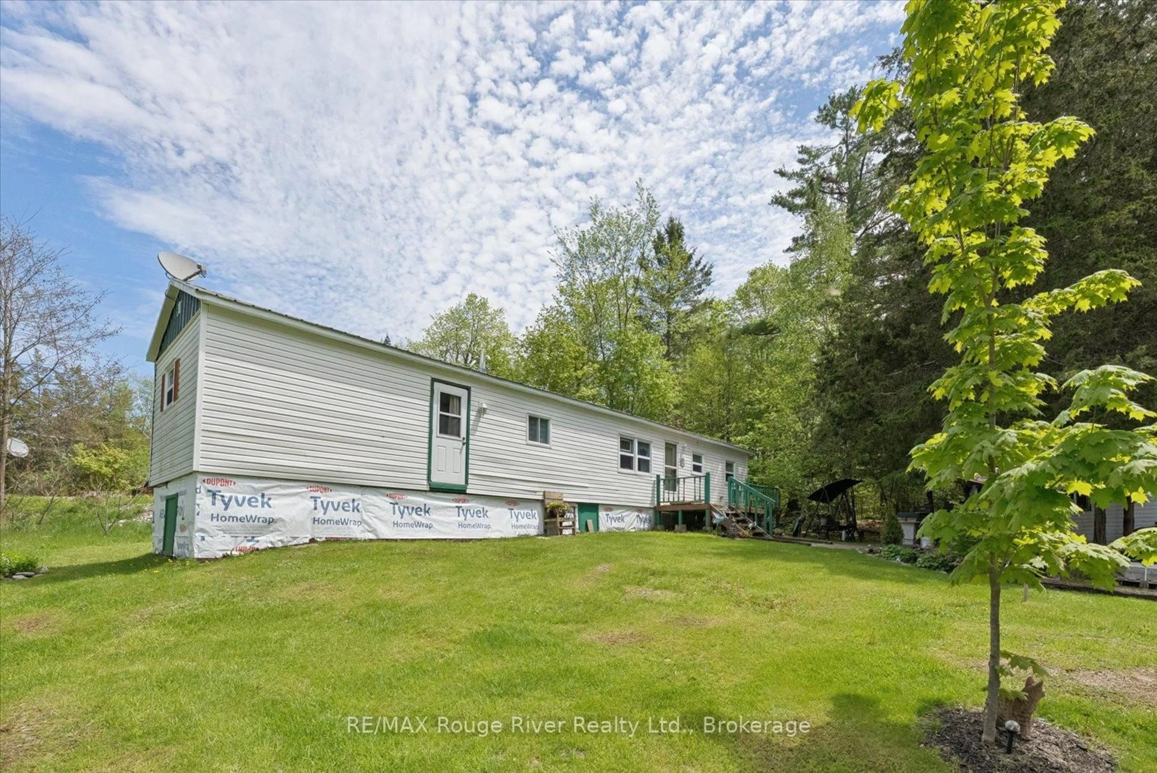A pic from outside/outdoor area/front of a property/back of a property/a pic from drone, water/lake/river/ocean view for 189 Pine Lane, Trent Hills Ontario K0K 2M0