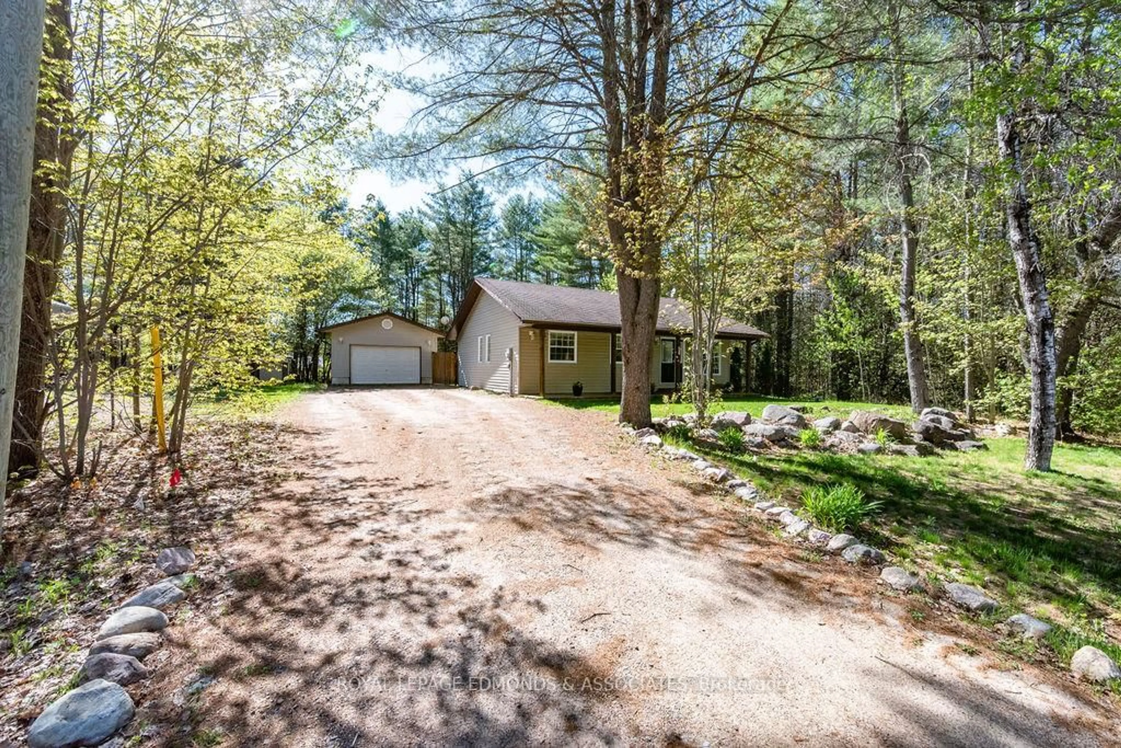 A pic from outside/outdoor area/front of a property/back of a property/a pic from drone, forest/trees view for 58 Legere Dr, Deep River Ontario K0J 1P0