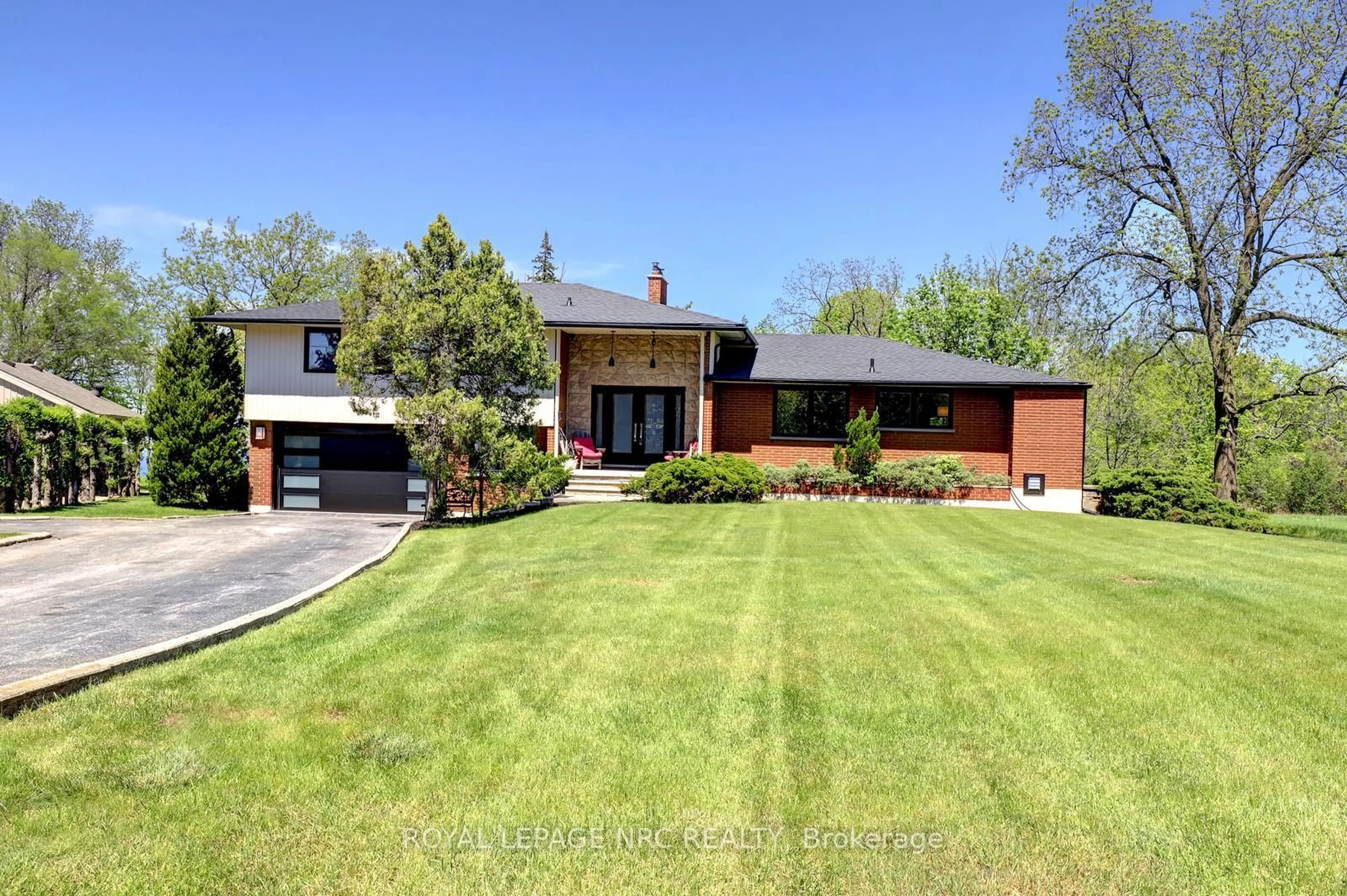 Home with brick exterior material, street for 44 Fifty Rd, Hamilton Ontario L8J 2X6