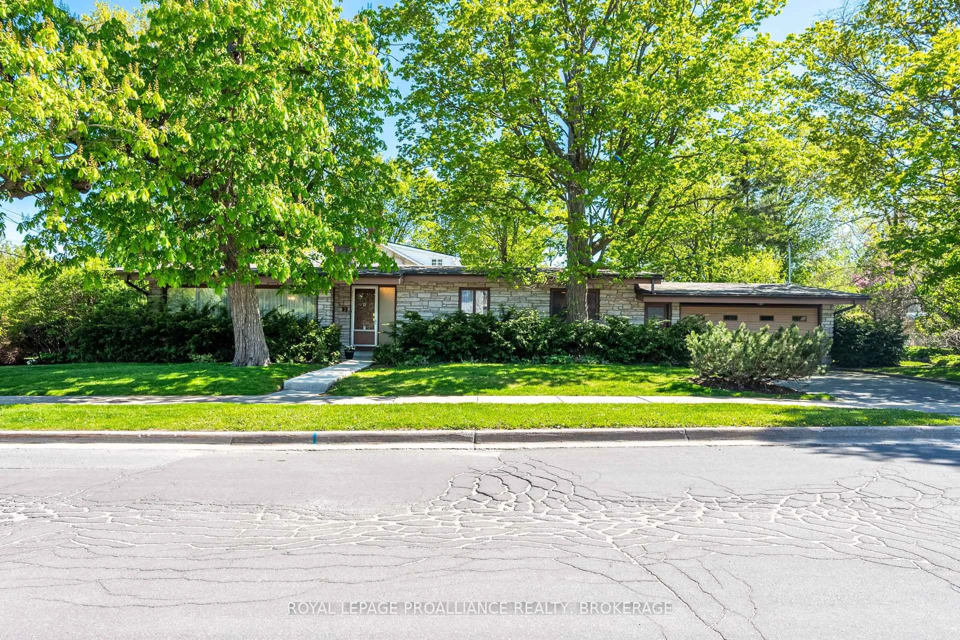 Home with brick exterior material, street for 2 Churchill St, Kingston Ontario K7M 2K5