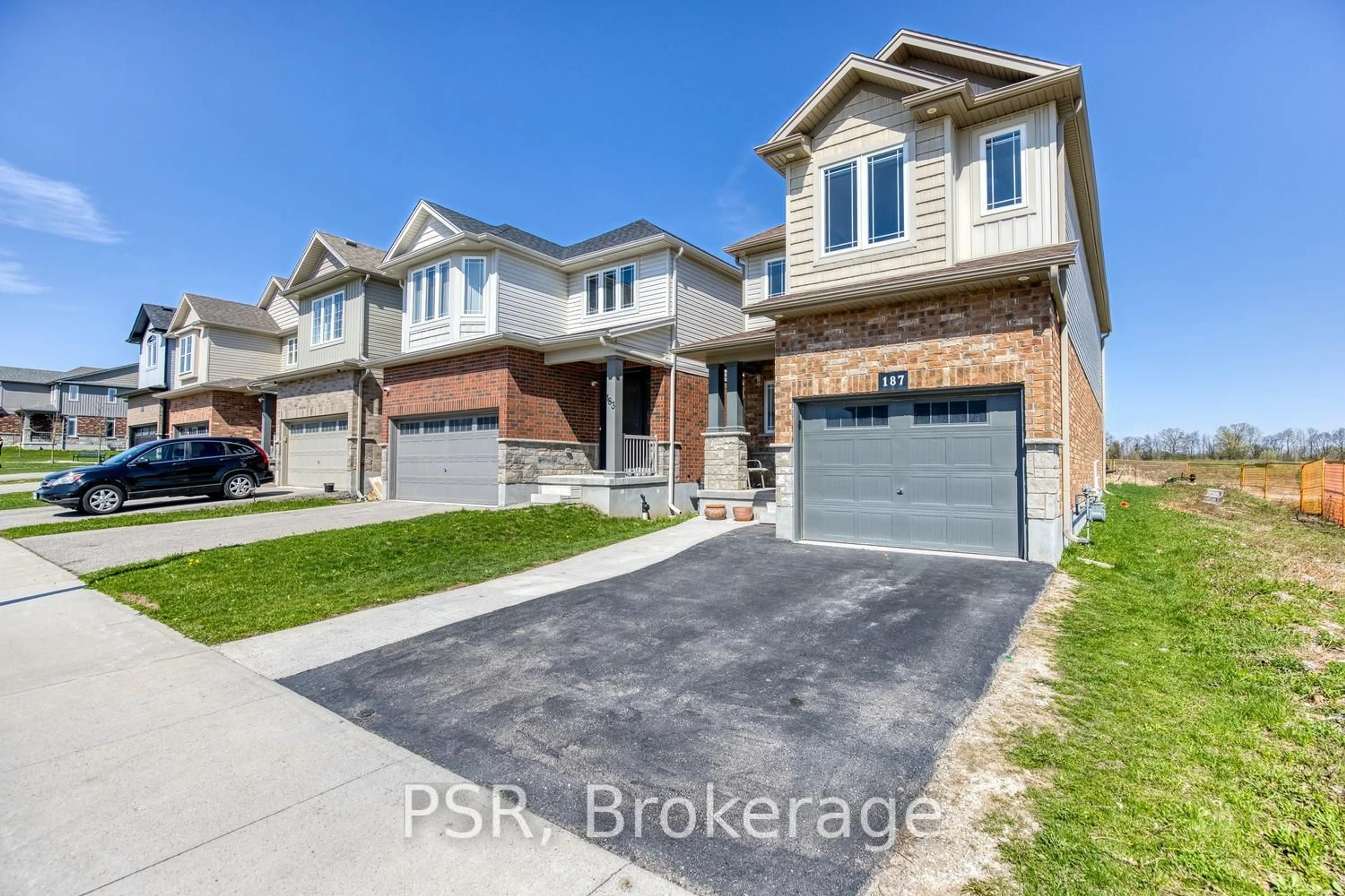 Home with brick exterior material, street for 187 Rivertrail Ave, Kitchener Ontario N2A 0J7