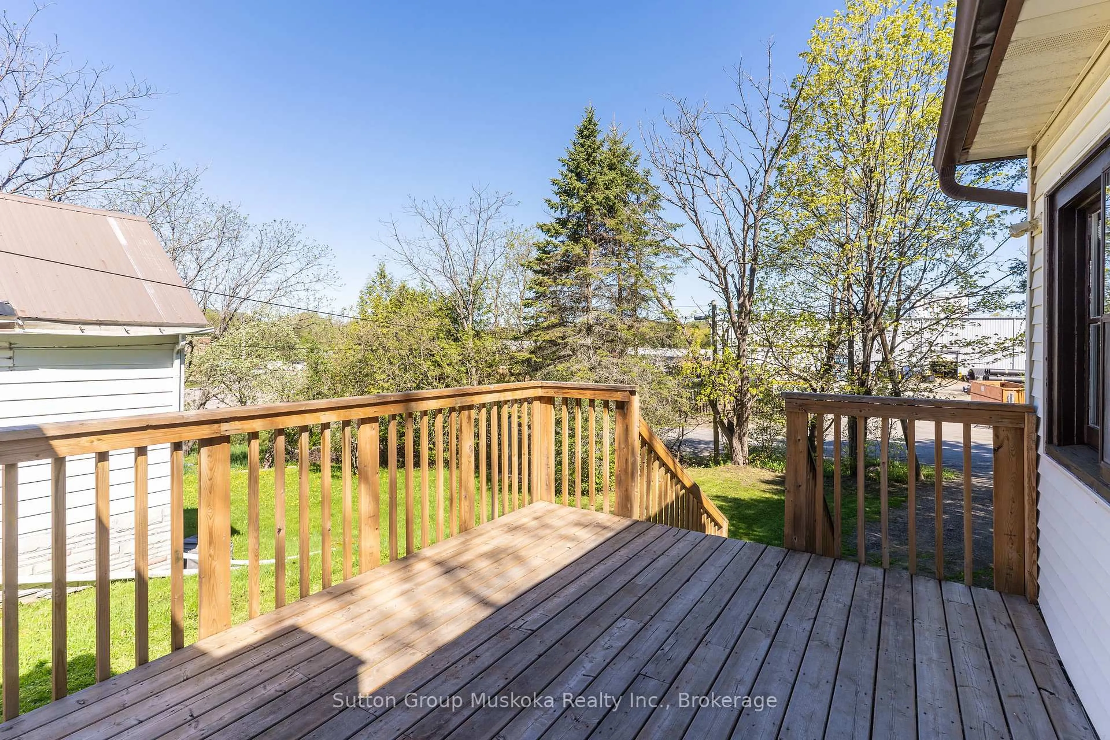 Patio, forest/trees view for 18 Susan St, Huntsville Ontario P1H 1X4