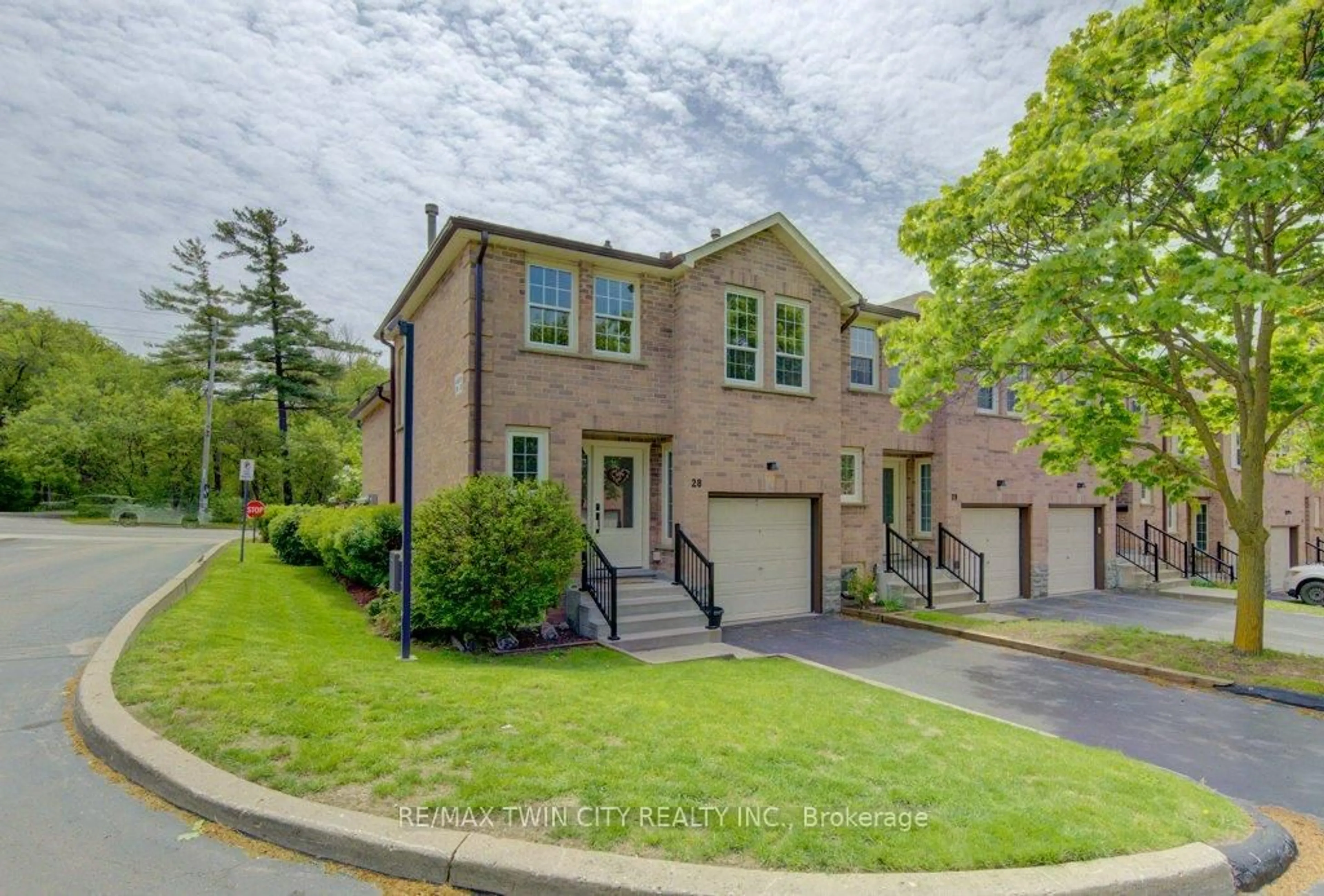 Home with brick exterior material, street for 375 Holiday Inn Dr #28, Cambridge Ontario N3C 3P6
