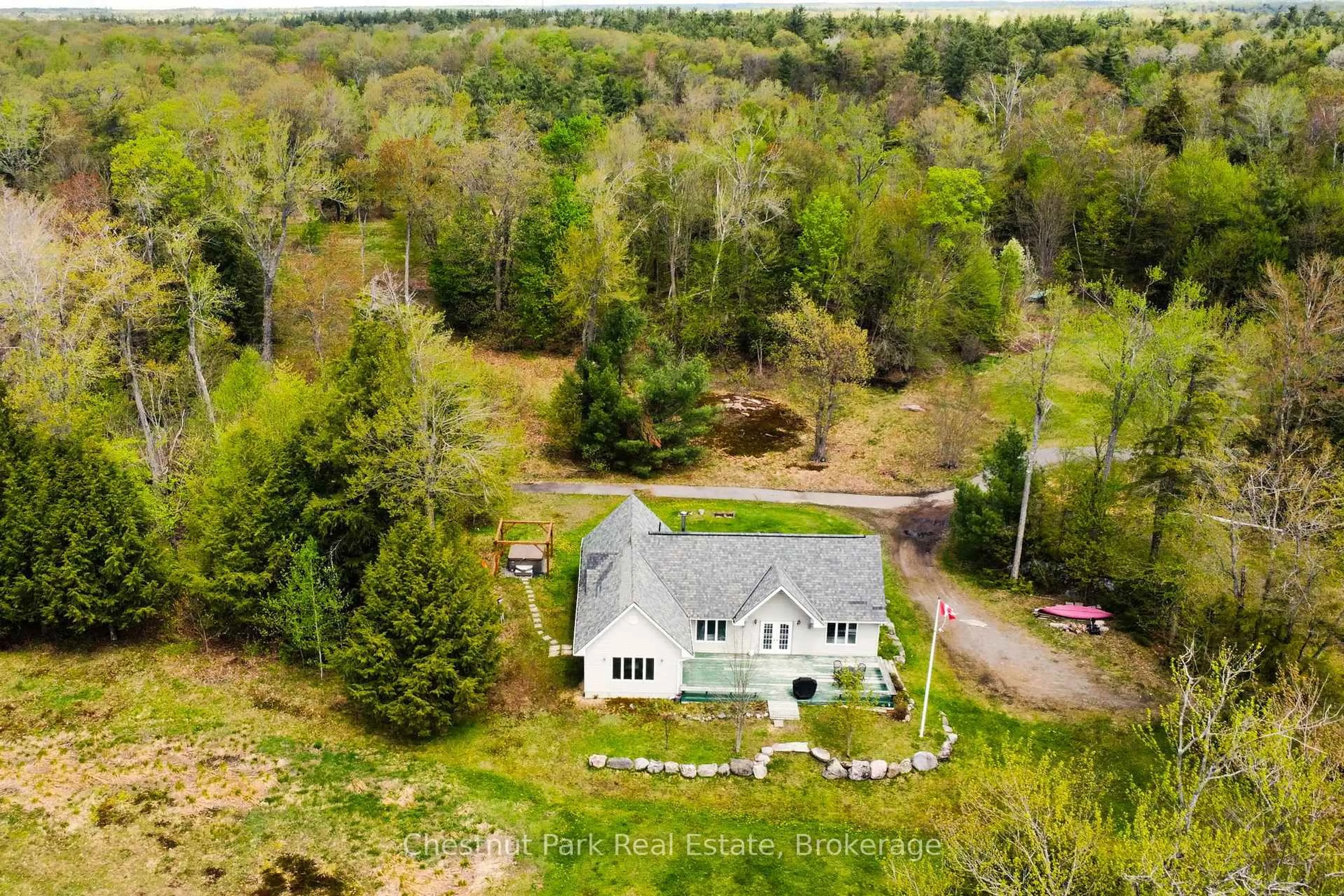 A pic from outside/outdoor area/front of a property/back of a property/a pic from drone, unknown for 1100 Moon River Rd, Muskoka Lakes Ontario P0C 1A0