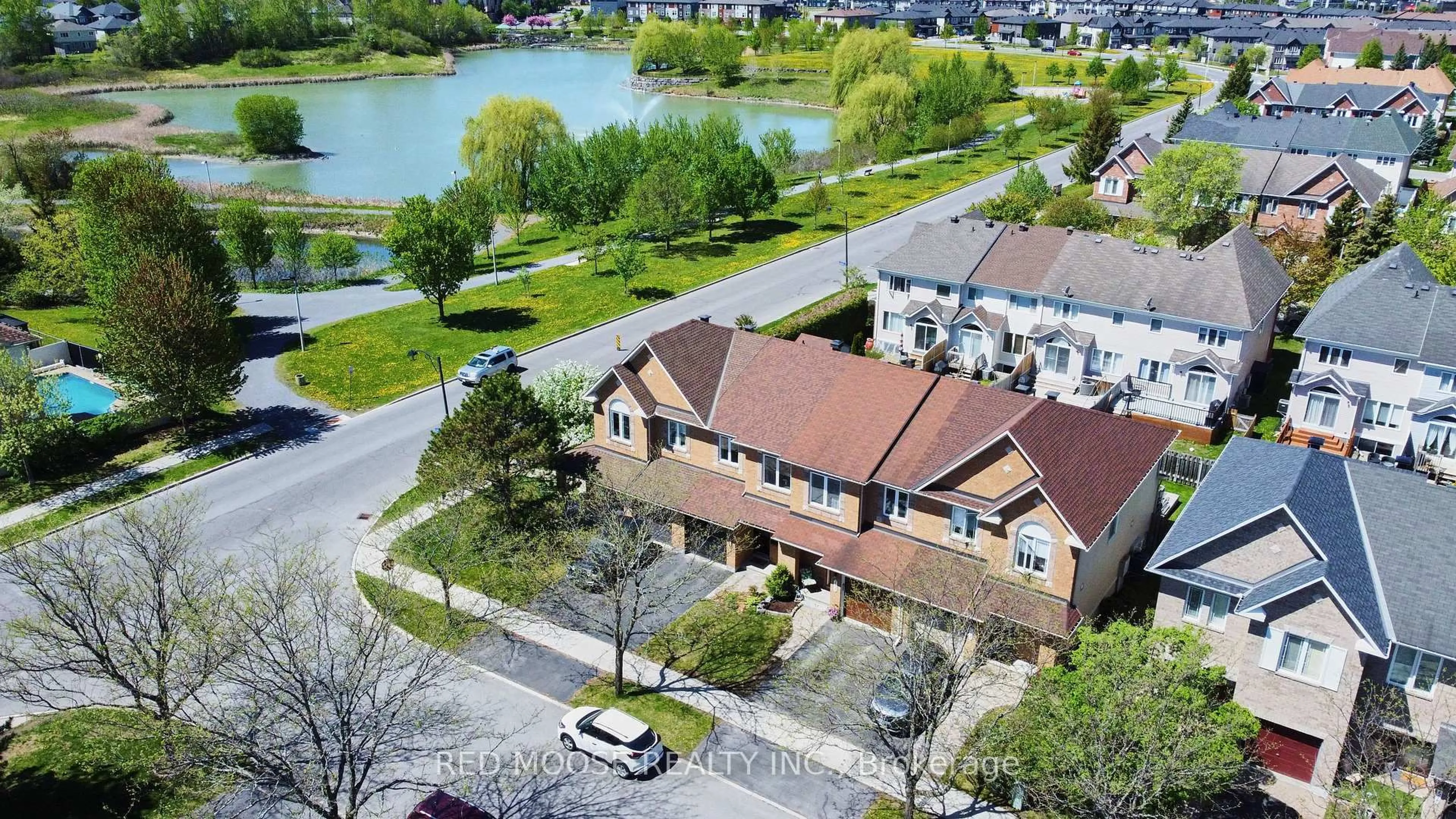 A pic from outside/outdoor area/front of a property/back of a property/a pic from drone, water/lake/river/ocean view for 2285 Brockstone Cres, Ottawa Ontario K4A 4V3