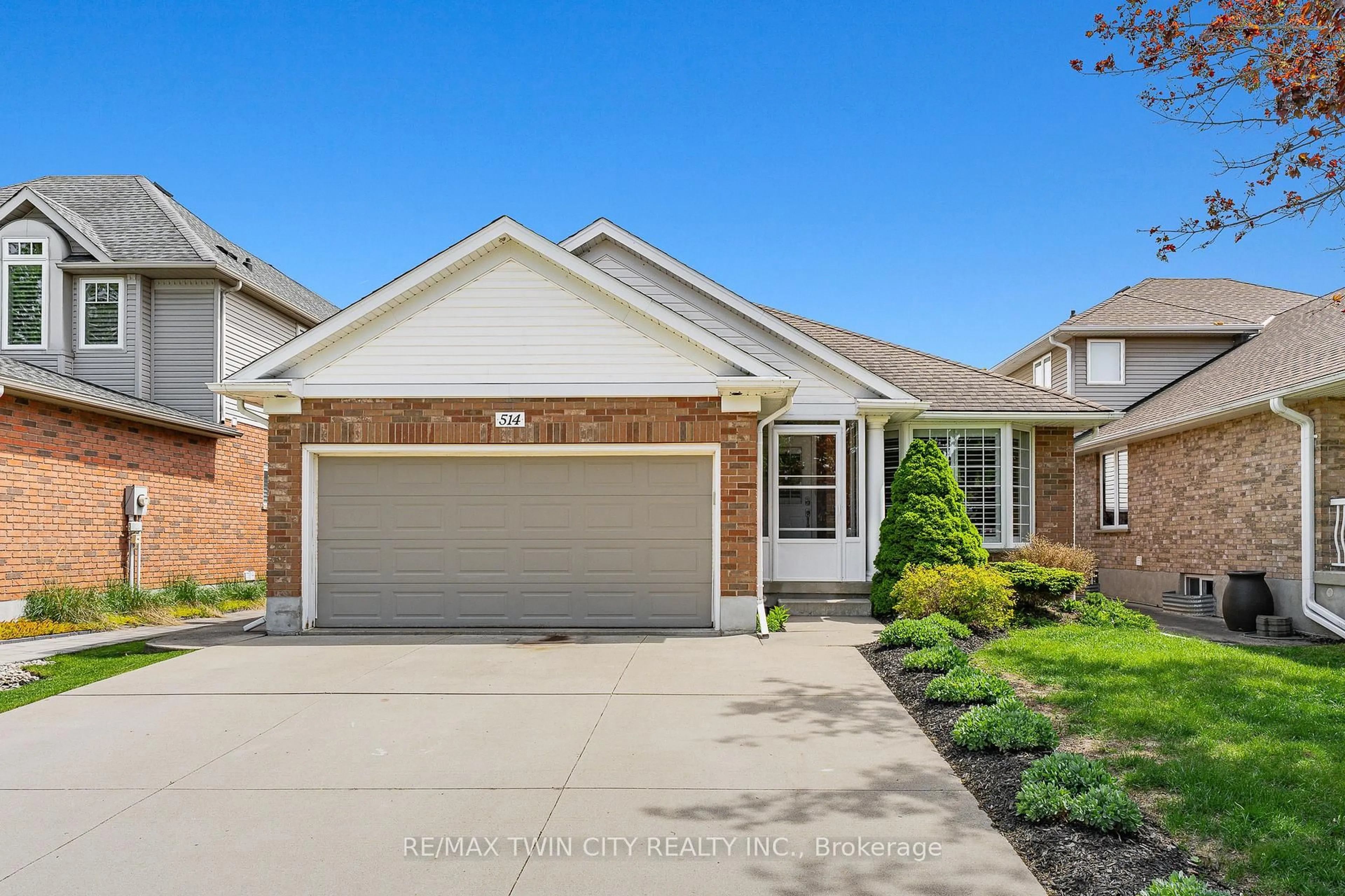 Home with brick exterior material, street for 514 Brentcliffe Dr, Waterloo Ontario N2T 2S4