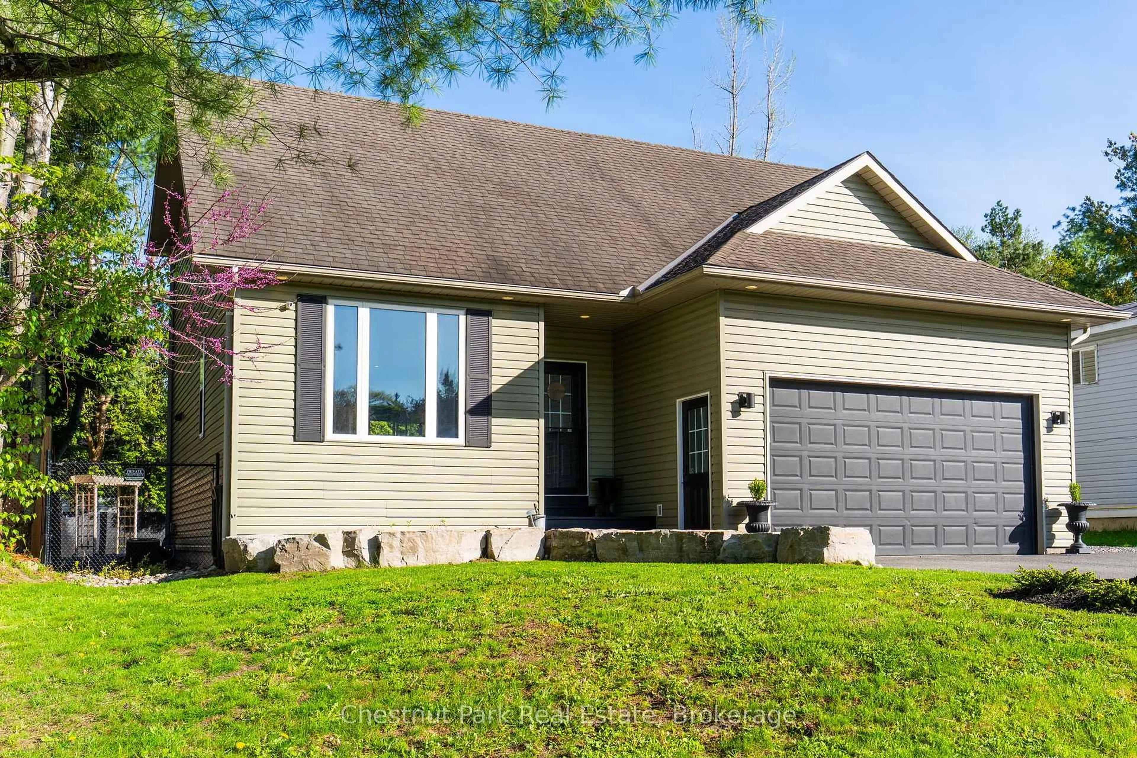 Home with vinyl exterior material, street for 6 Johnston St, Muskoka Lakes Ontario P0B 1J0