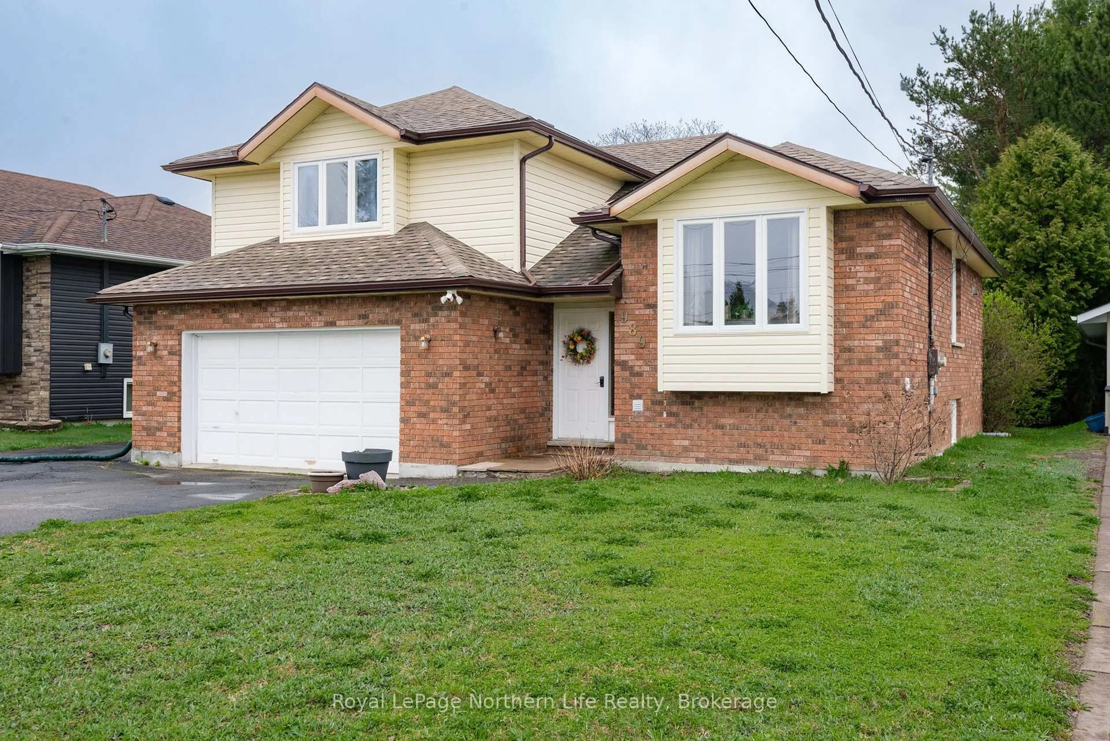 Home with brick exterior material, street for 989 Annette St, Greater Sudbury Ontario P3P 1R9