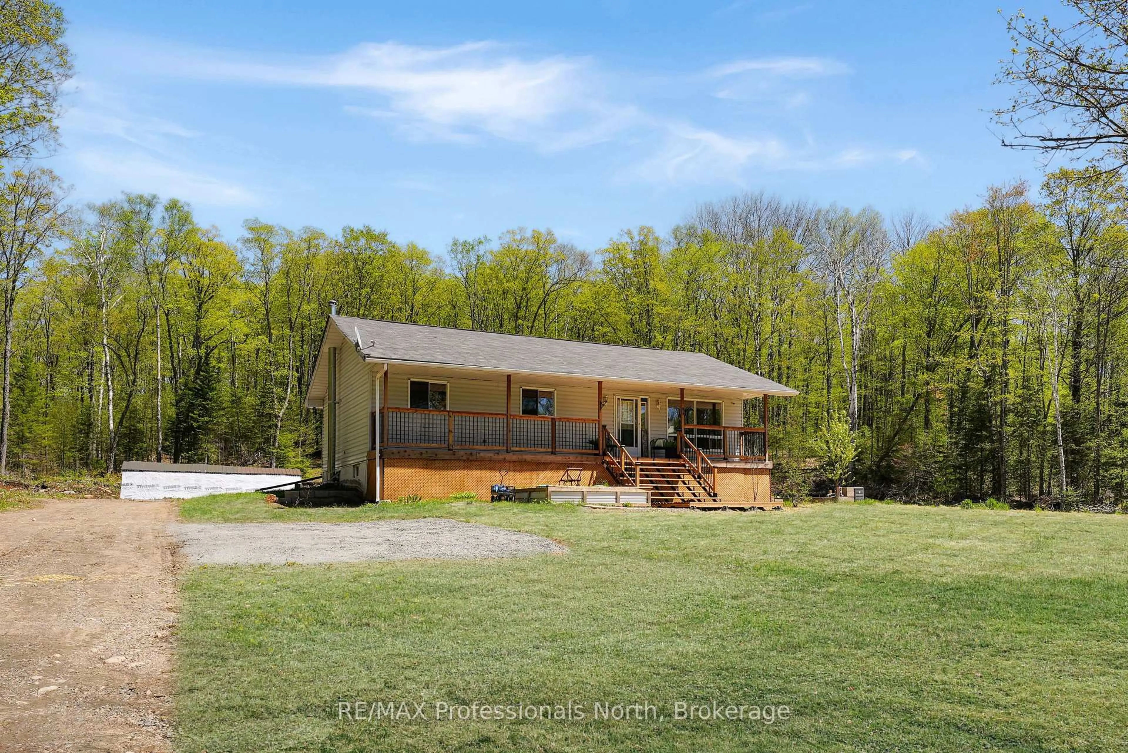 A pic from outside/outdoor area/front of a property/back of a property/a pic from drone, unknown for 1244 Clement Lake Rd, Highlands East Ontario K0L 3C0