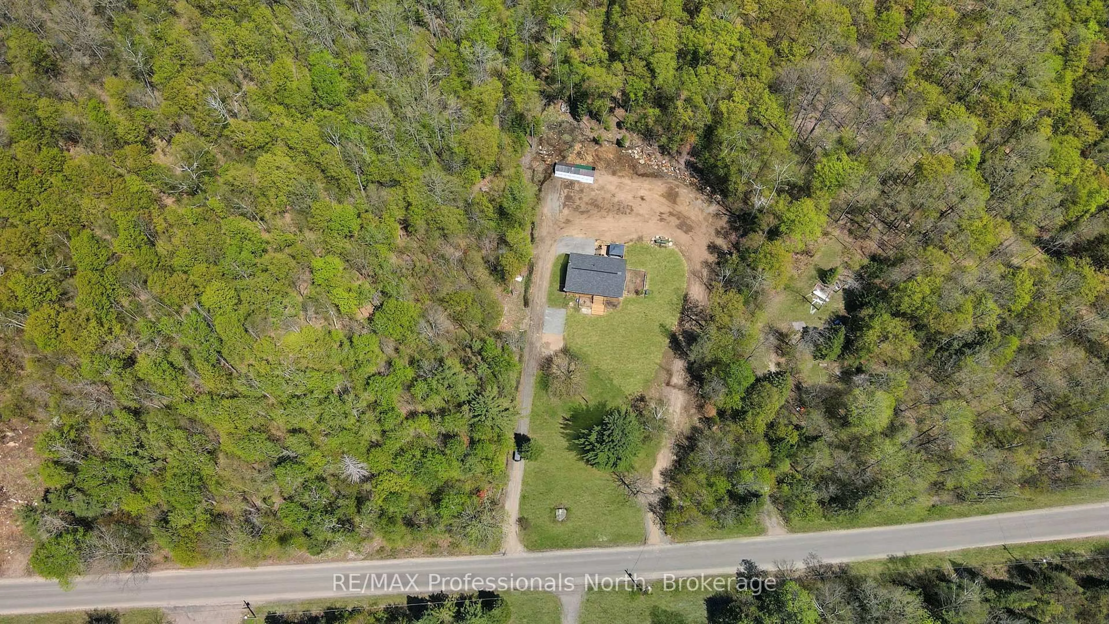 A pic from outside/outdoor area/front of a property/back of a property/a pic from drone, unknown for 1244 Clement Lake Rd, Highlands East Ontario K0L 3C0