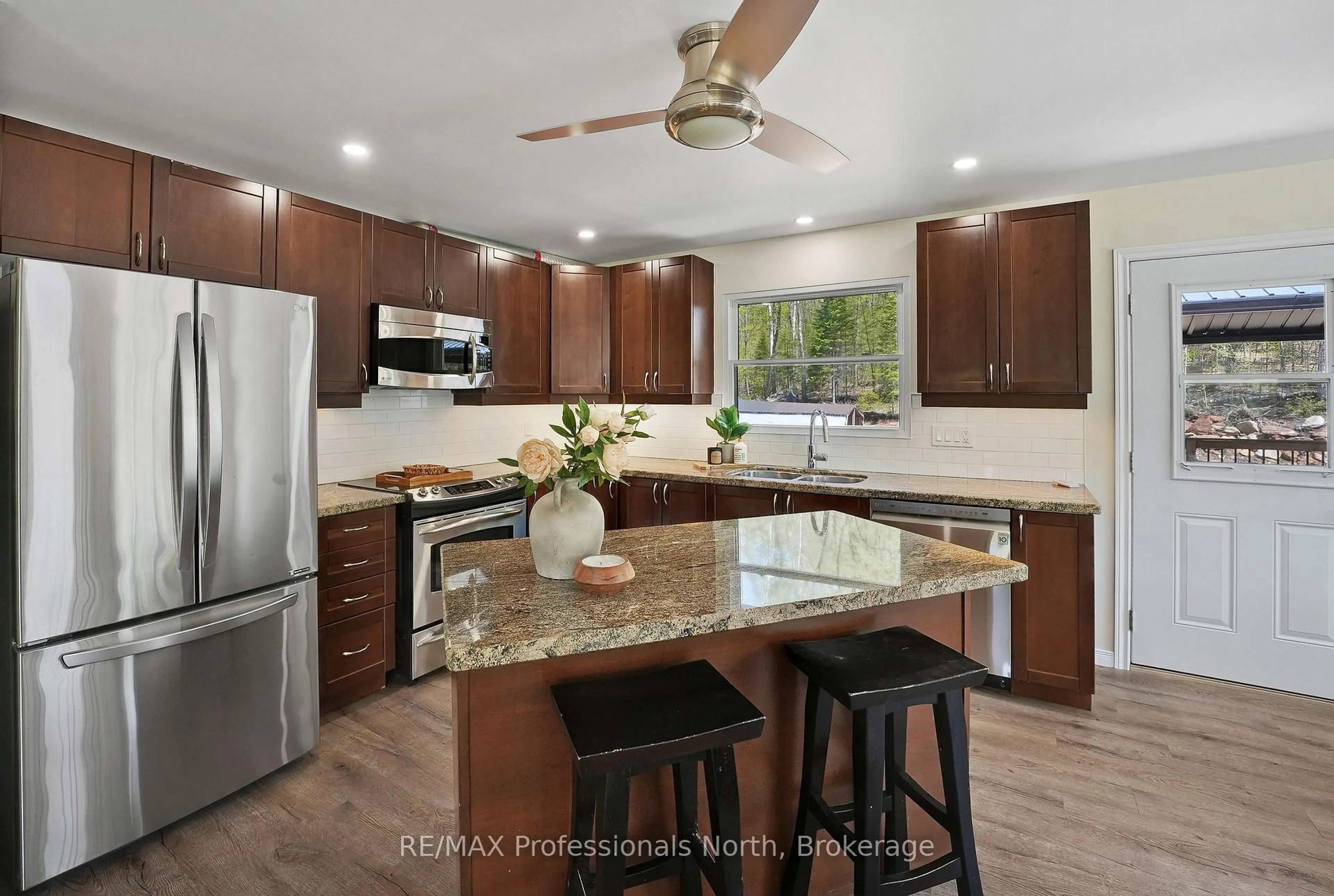 Open concept kitchen, ceramic/tile floor for 1244 Clement Lake Rd, Highlands East Ontario K0L 3C0