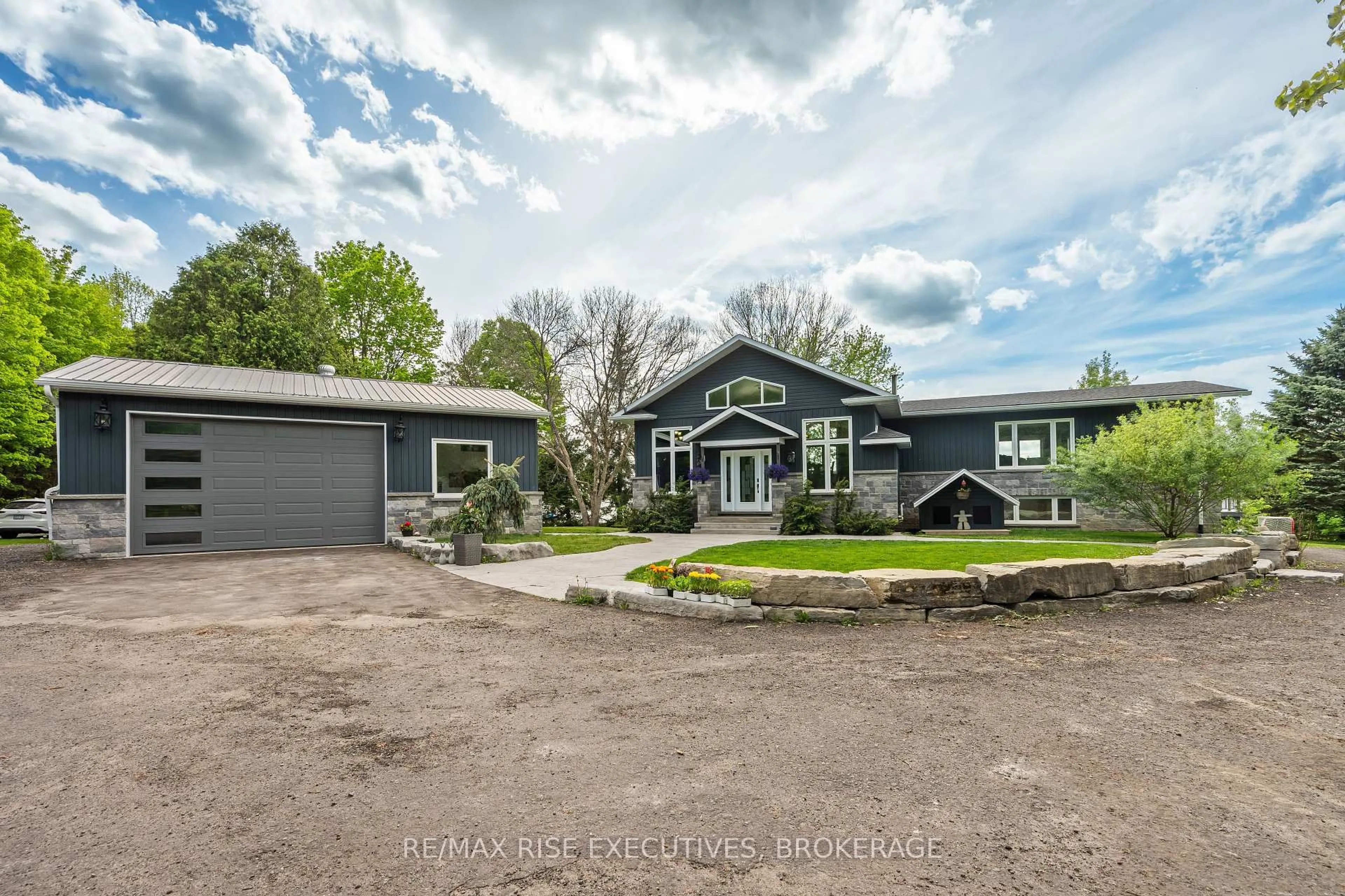 A pic from outside/outdoor area/front of a property/back of a property/a pic from drone, street for 801 Camp Lane, Leeds and the Thousand Islands Ontario K0E 1N0