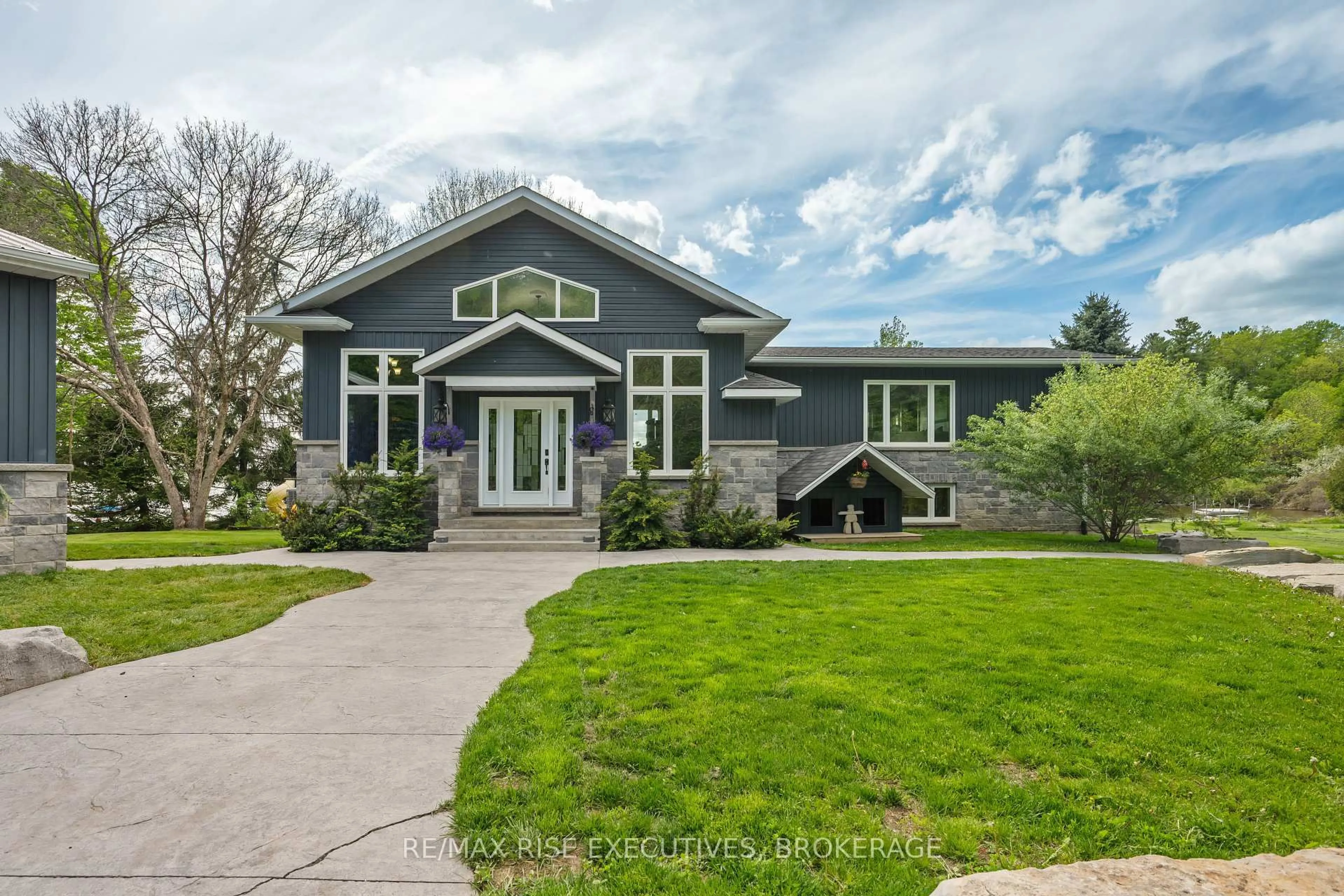 Home with vinyl exterior material, street for 801 Camp Lane, Leeds and the Thousand Islands Ontario K0E 1N0