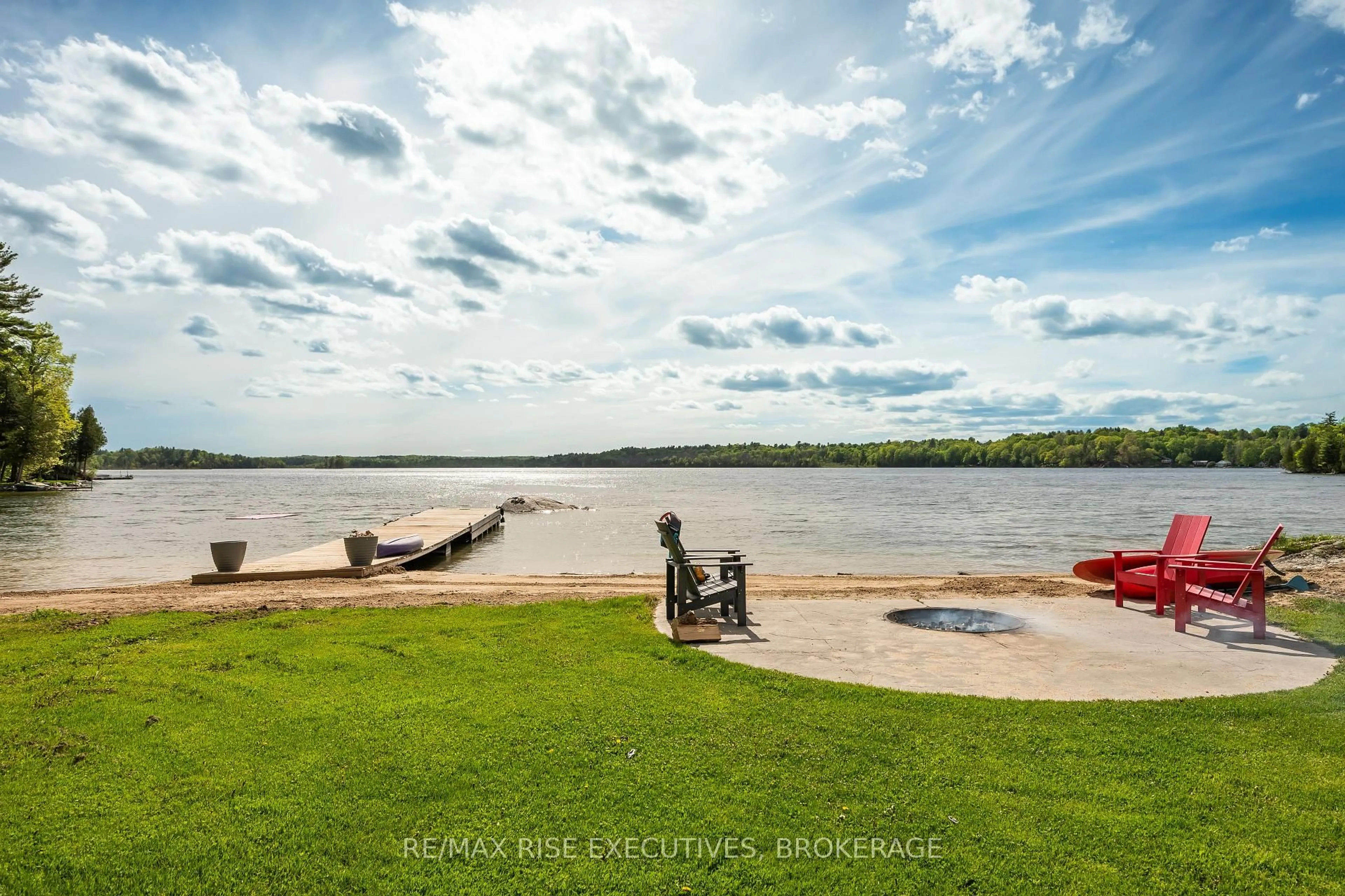 A pic from outside/outdoor area/front of a property/back of a property/a pic from drone, water/lake/river/ocean view for 801 Camp Lane, Leeds and the Thousand Islands Ontario K0E 1N0