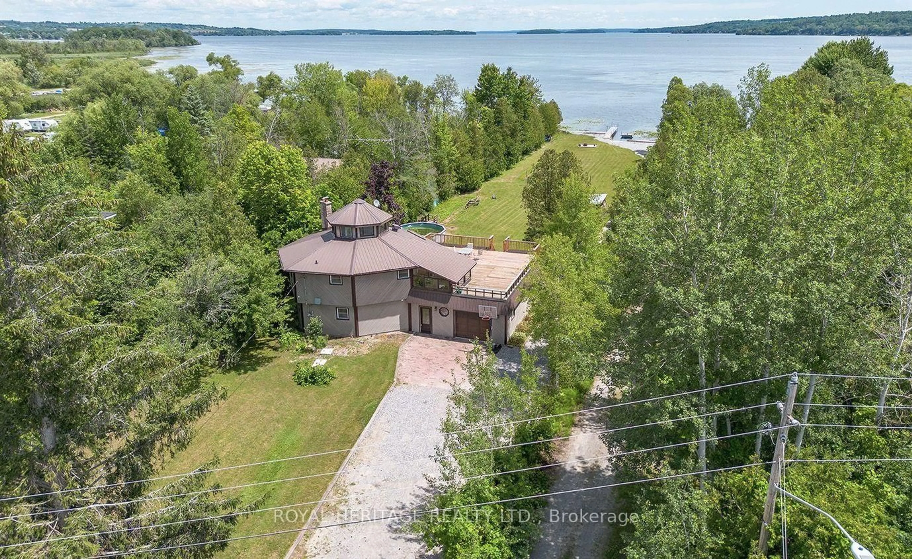 A pic from outside/outdoor area/front of a property/back of a property/a pic from drone, water/lake/river/ocean view for 5225 Rice Lake Dr, Hamilton Township Ontario K0L 1E0