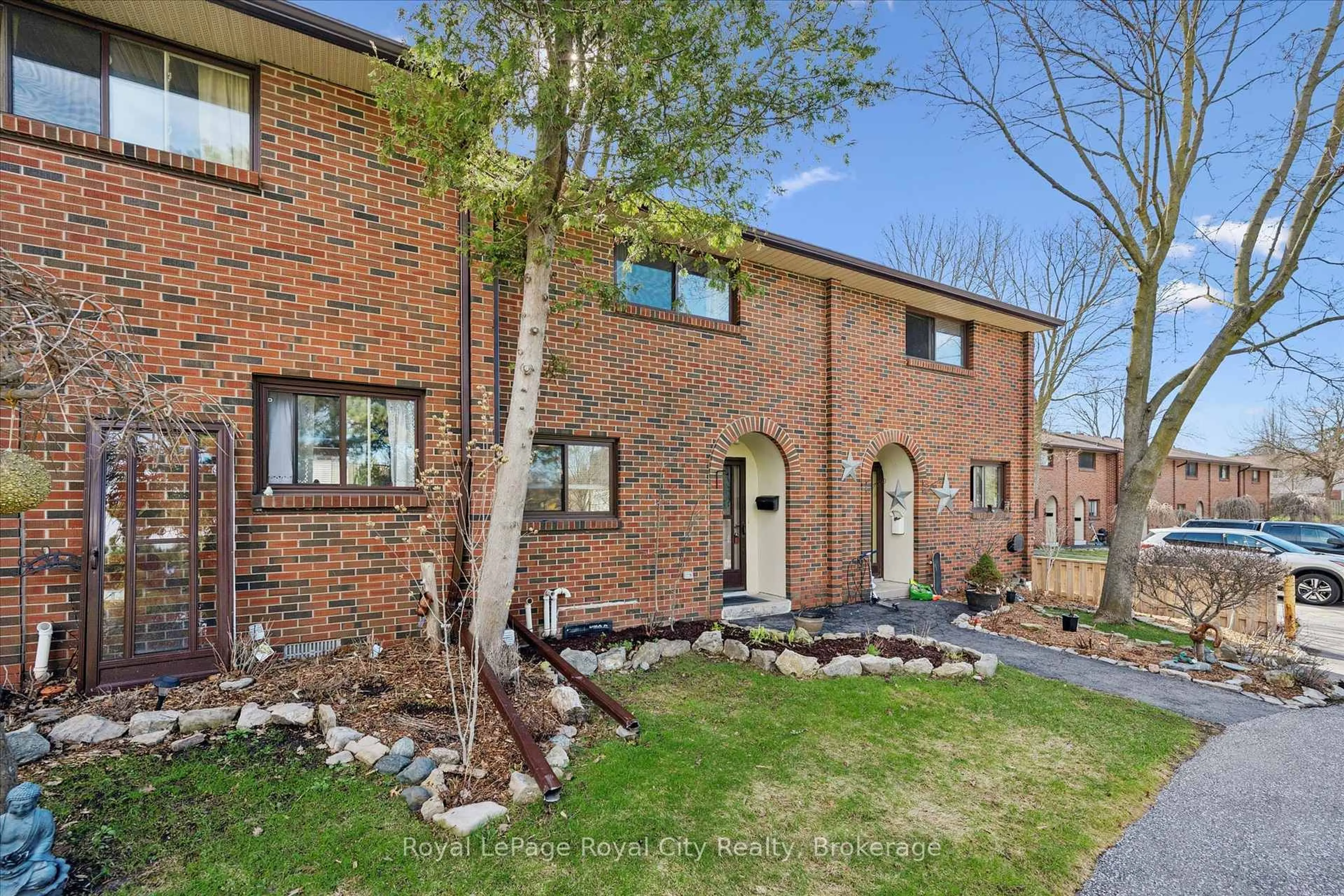 Home with brick exterior material, street for 41 Rhonda Rd #23, Guelph Ontario N1H 6H1