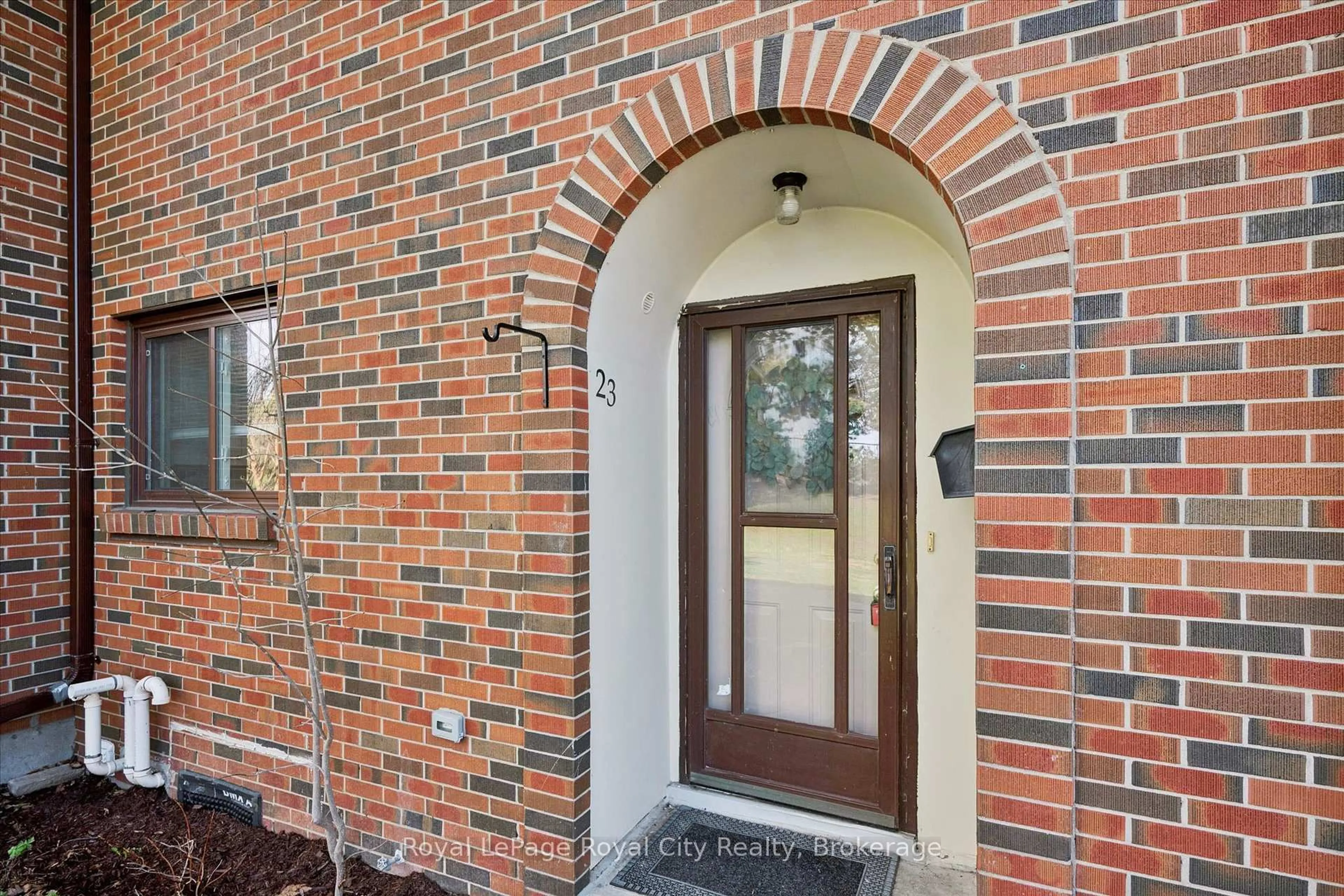 Home with brick exterior material, street for 41 Rhonda Rd #23, Guelph Ontario N1H 6H1