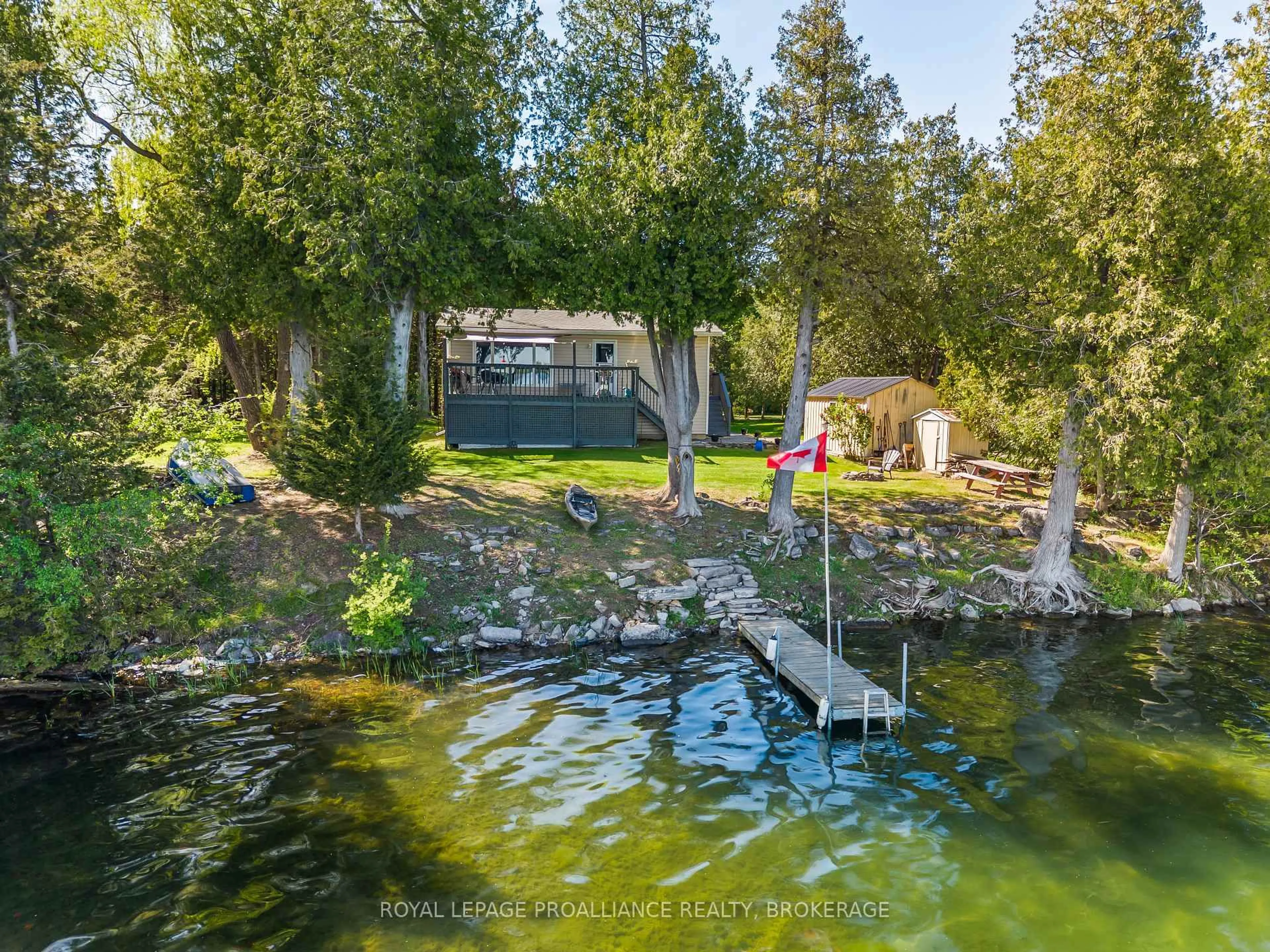 A pic from outside/outdoor area/front of a property/back of a property/a pic from drone, water/lake/river/ocean view for 180 Switzer Lane, Yarker Ontario K0K 3N0