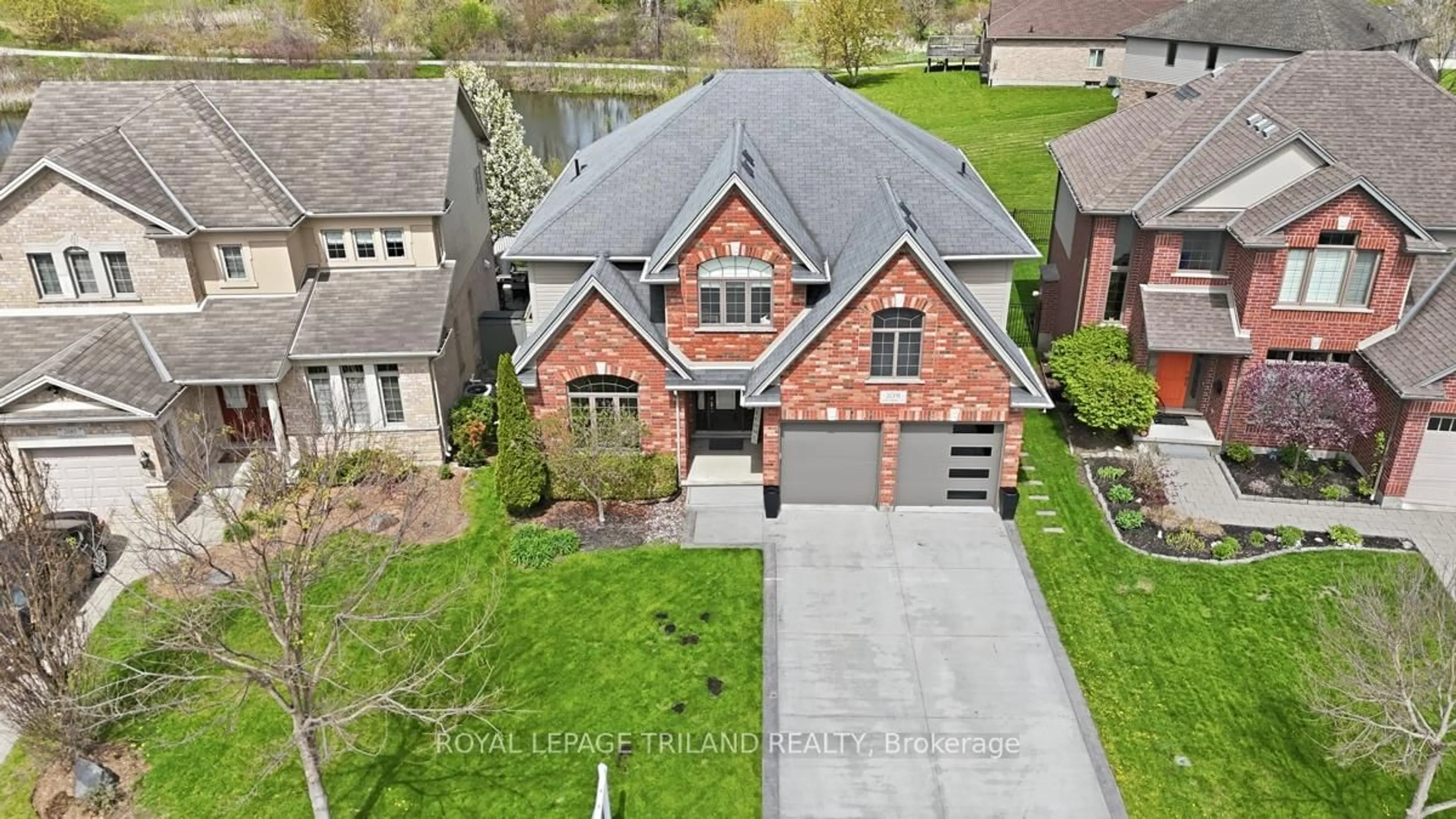 A pic from outside/outdoor area/front of a property/back of a property/a pic from drone, street for 2091 Pennyroyal St, London North Ontario N5X 0E6