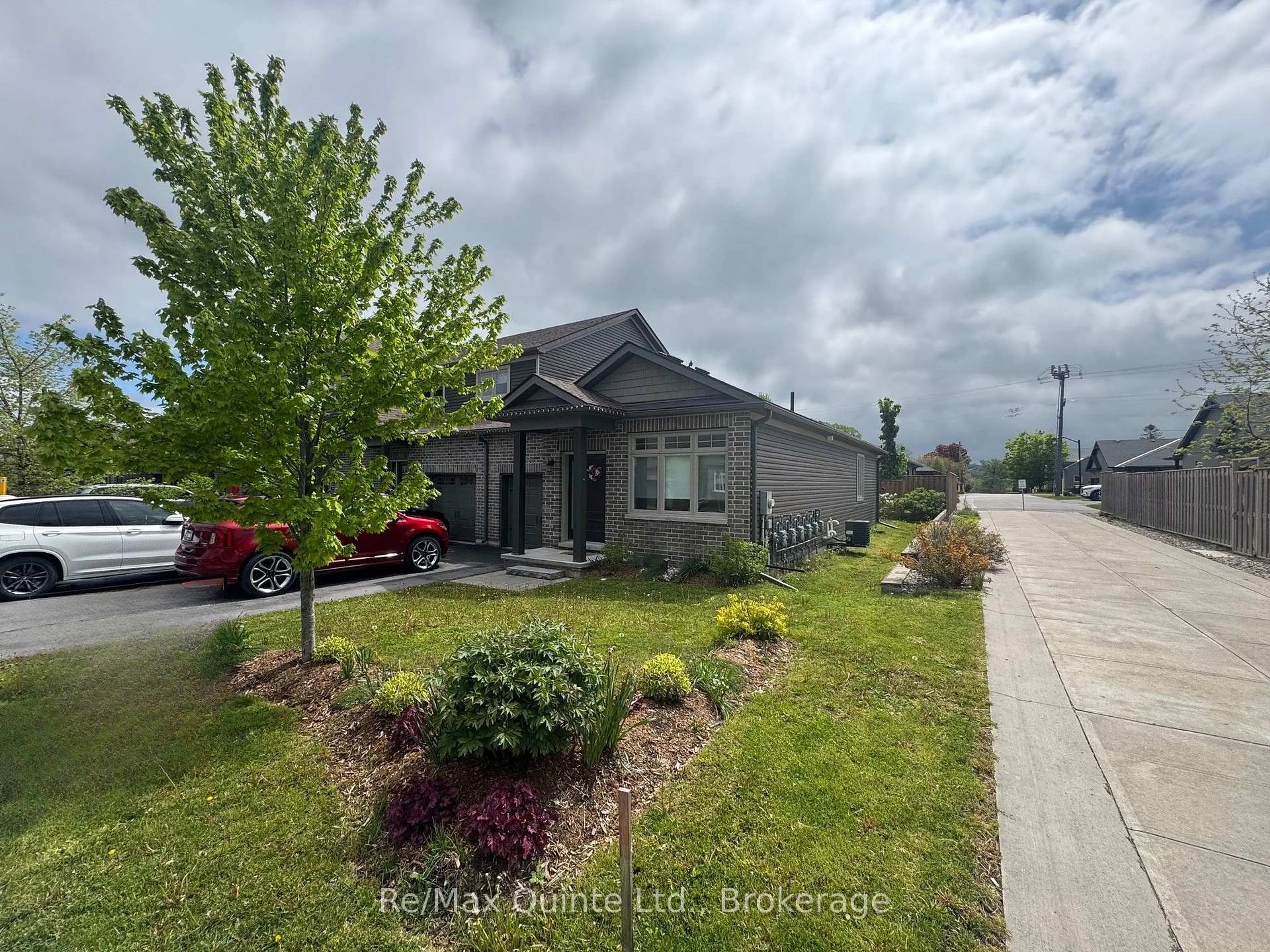 A pic from outside/outdoor area/front of a property/back of a property/a pic from drone, street for 28 Curtis St, Prince Edward County Ontario K0K 2T0