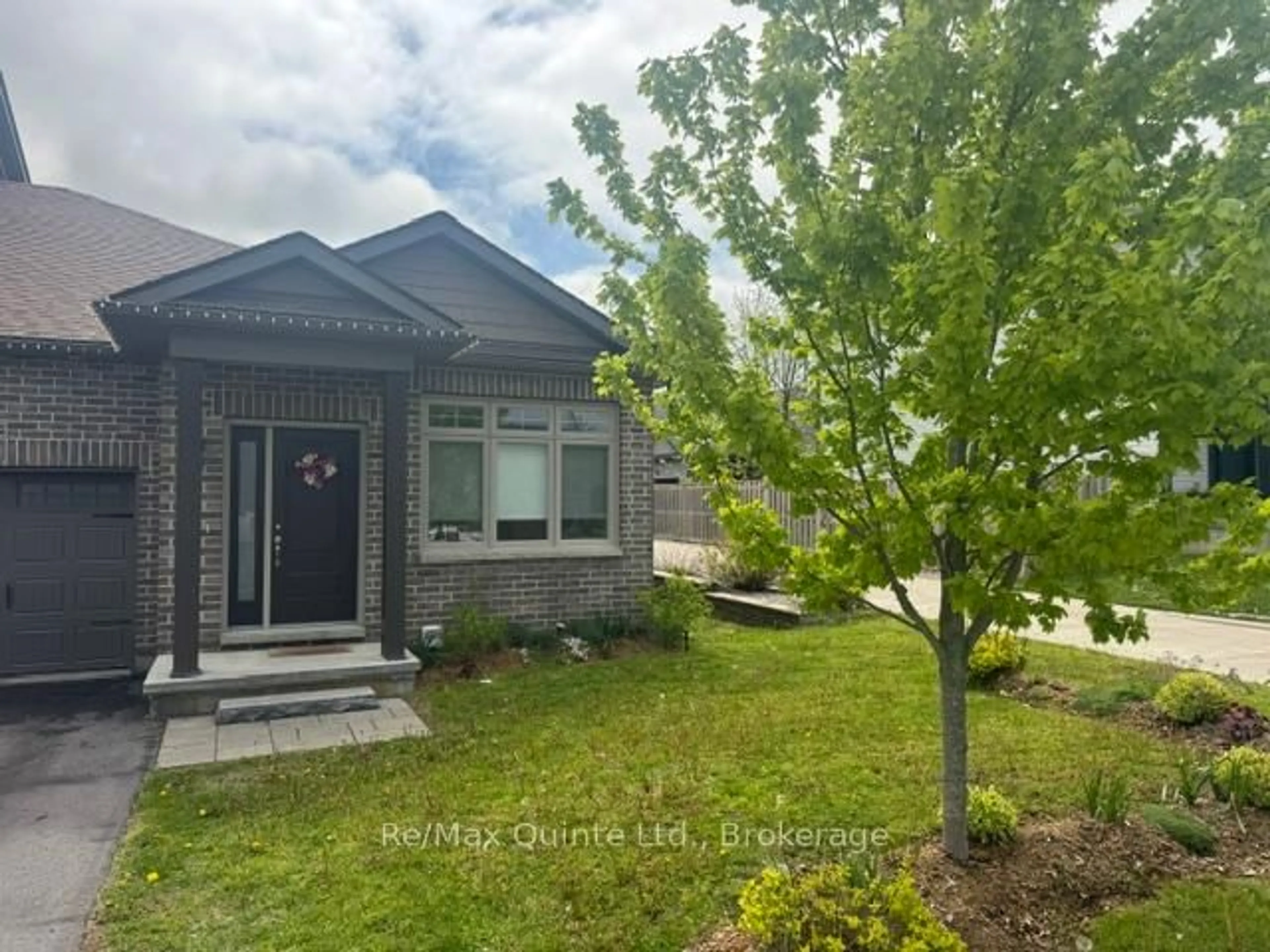 Home with brick exterior material, street for 28 Curtis St, Prince Edward County Ontario K0K 2T0