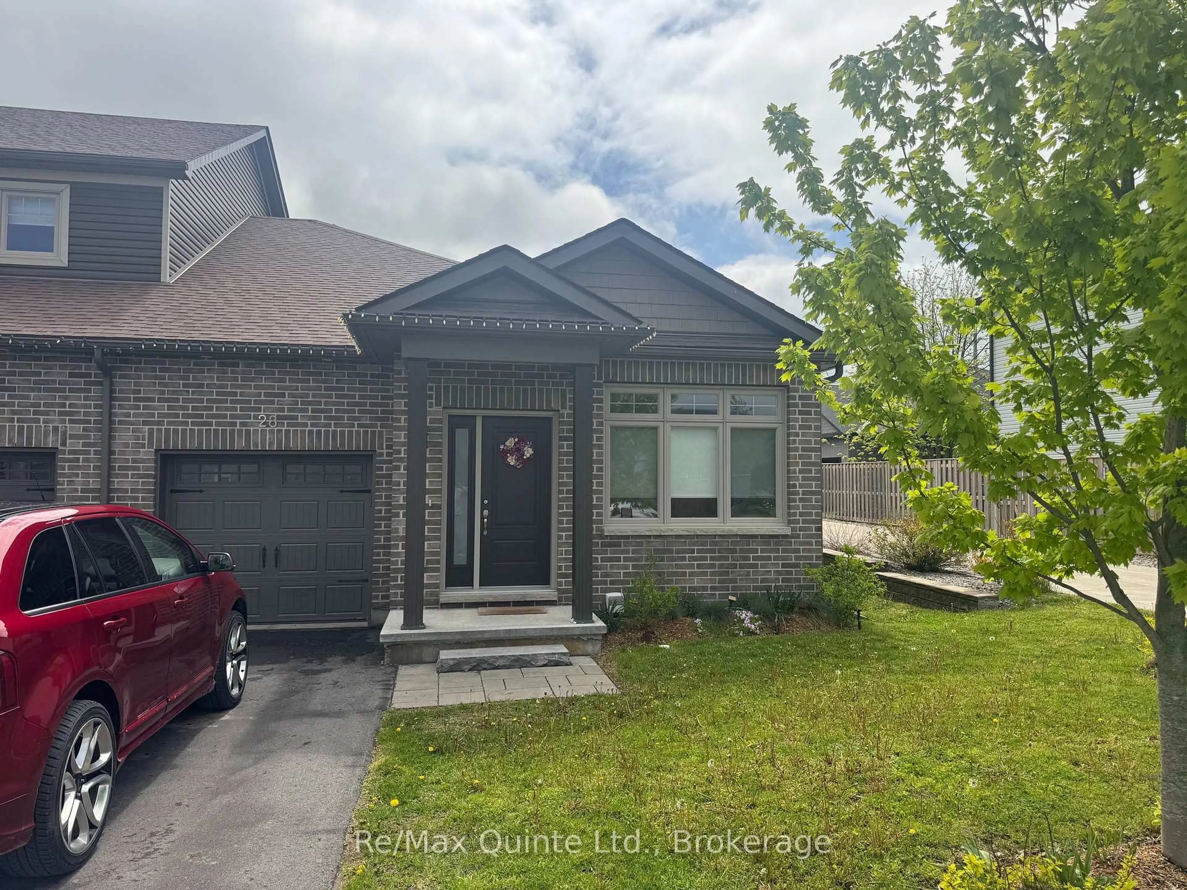 Home with brick exterior material, street for 28 Curtis St, Prince Edward County Ontario K0K 2T0