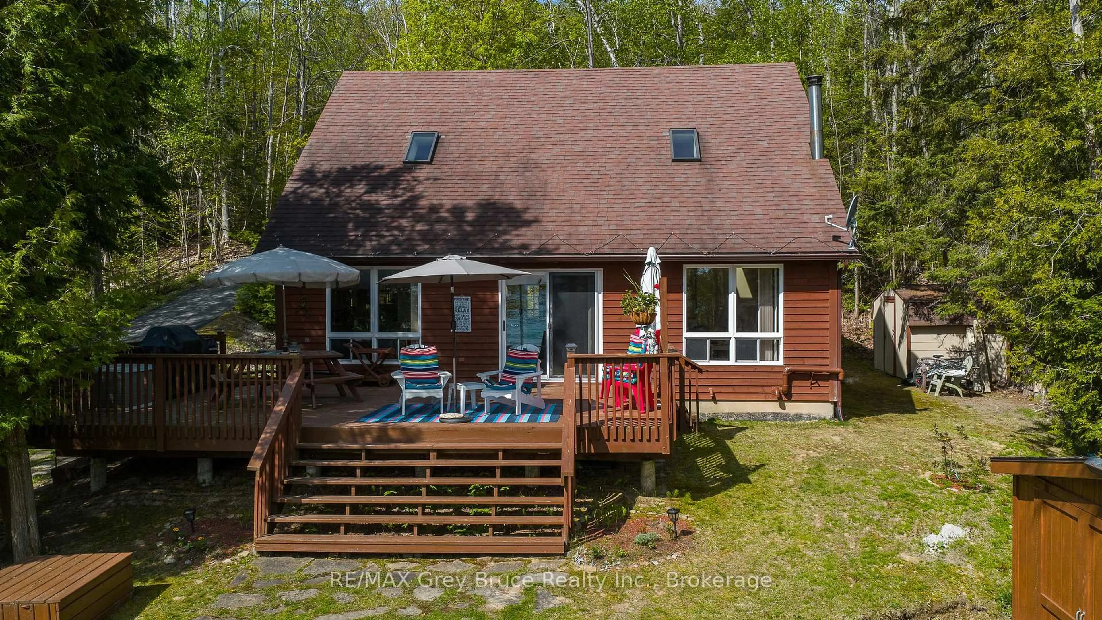 A pic from outside/outdoor area/front of a property/back of a property/a pic from drone, unknown for 504629 Grey Road 1, Georgian Bluffs Ontario N0H 2T0