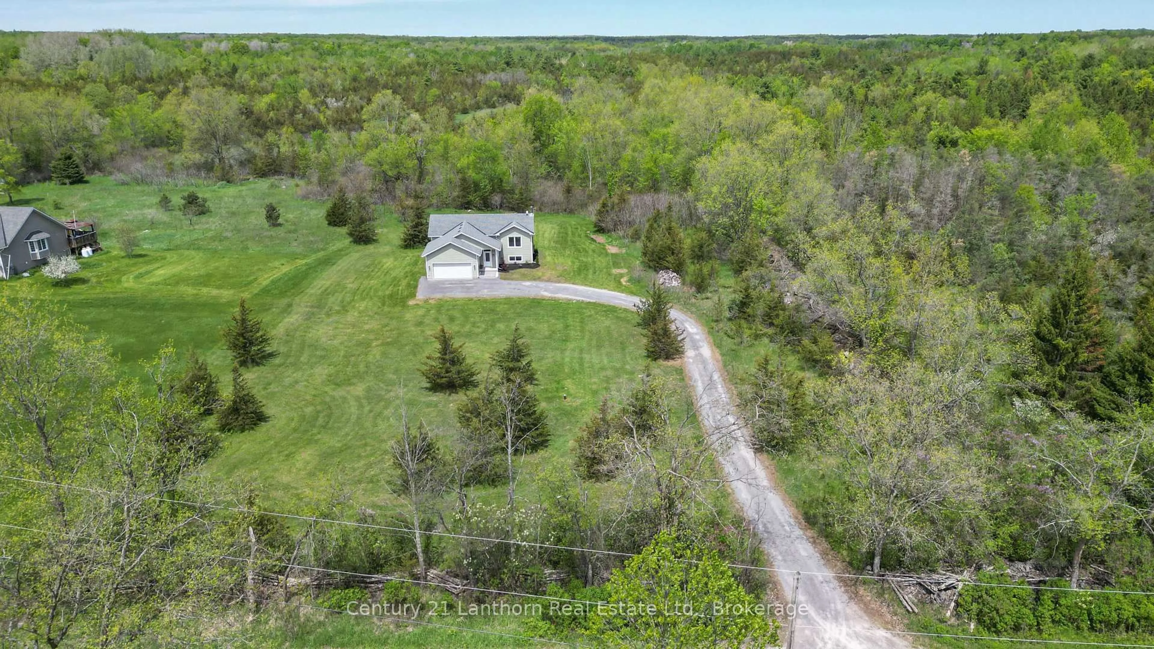 A pic from outside/outdoor area/front of a property/back of a property/a pic from drone, forest/trees view for 488 Johnston Rd, Thomasburg Ontario K0K 3H0