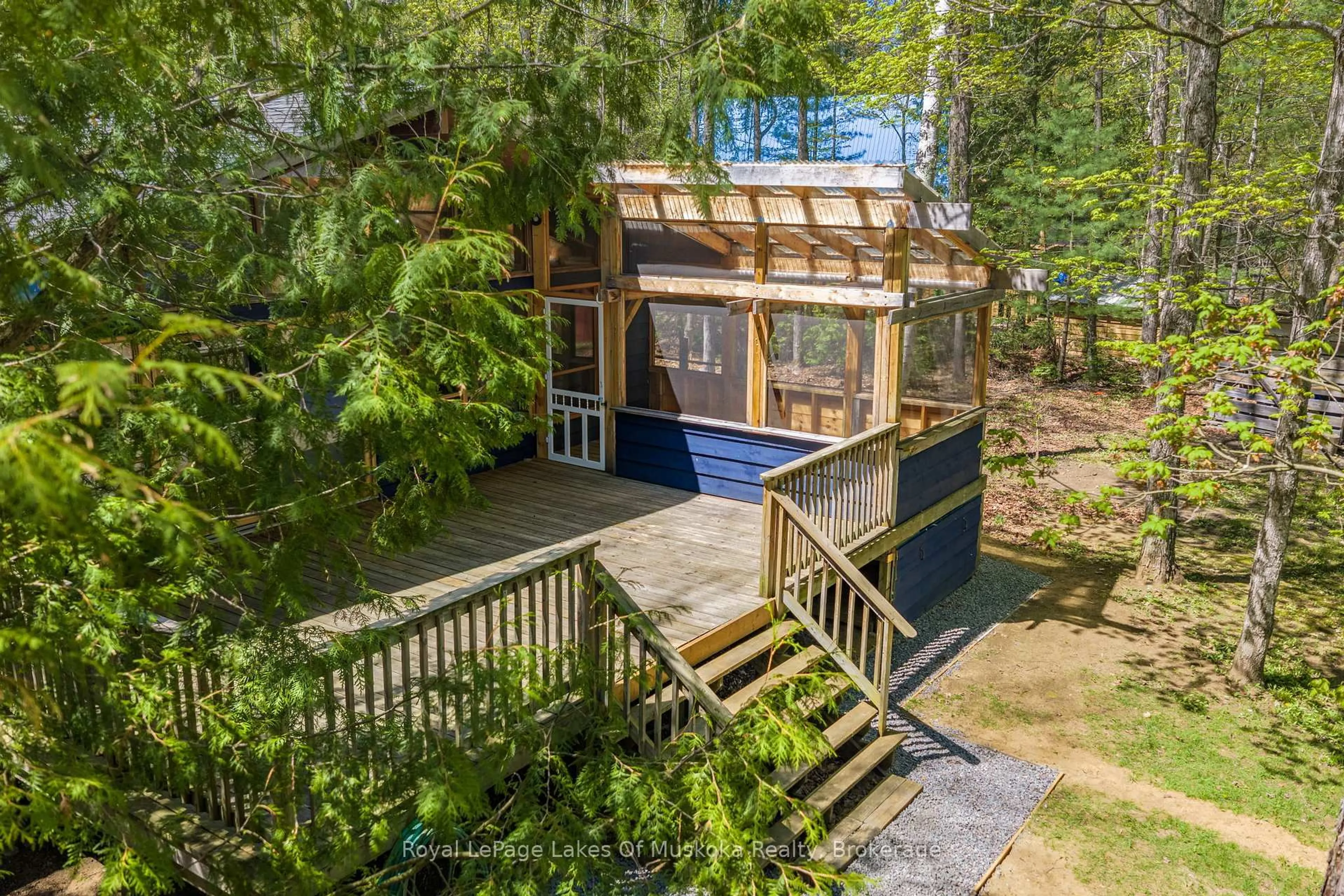 A pic from outside/outdoor area/front of a property/back of a property/a pic from drone, forest/trees view for 1213 Sherwood Forest Rd, Bracebridge Ontario P1L 1X3
