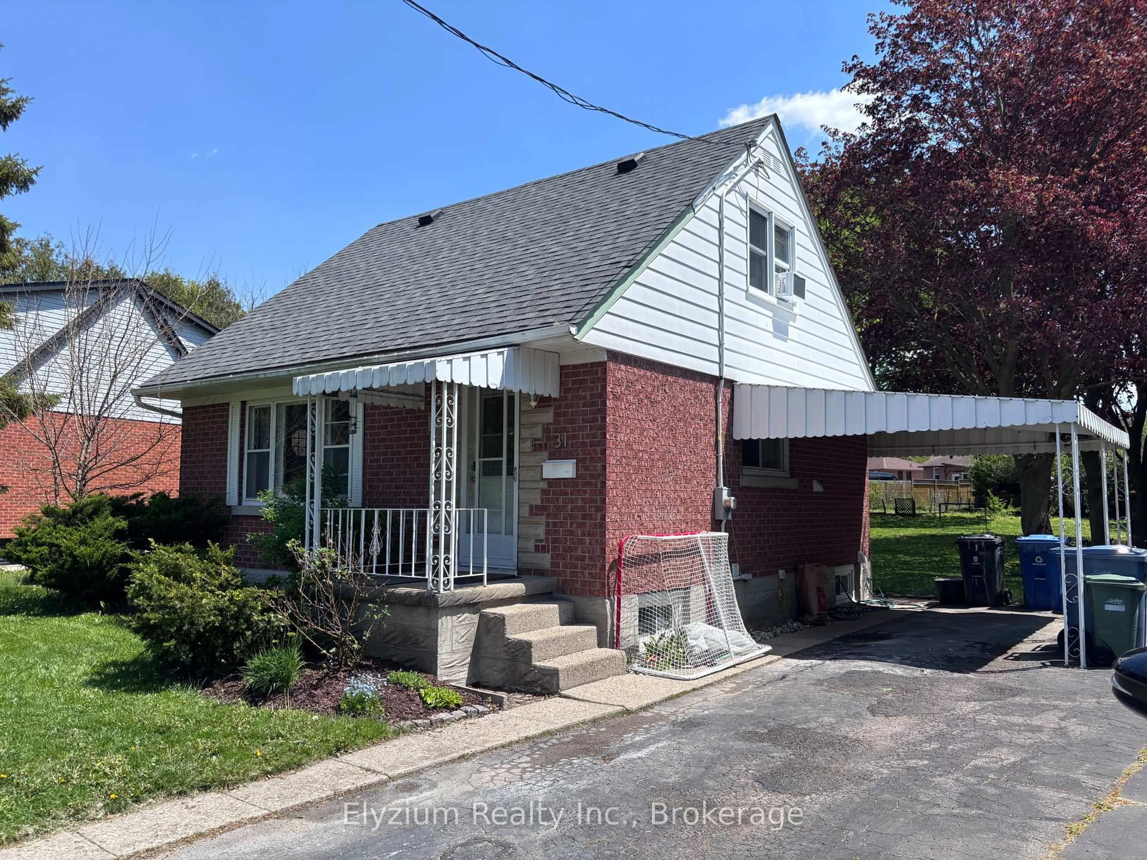 Home with brick exterior material, street for 31 Vancouver Dr, Guelph Ontario N1E 2E7