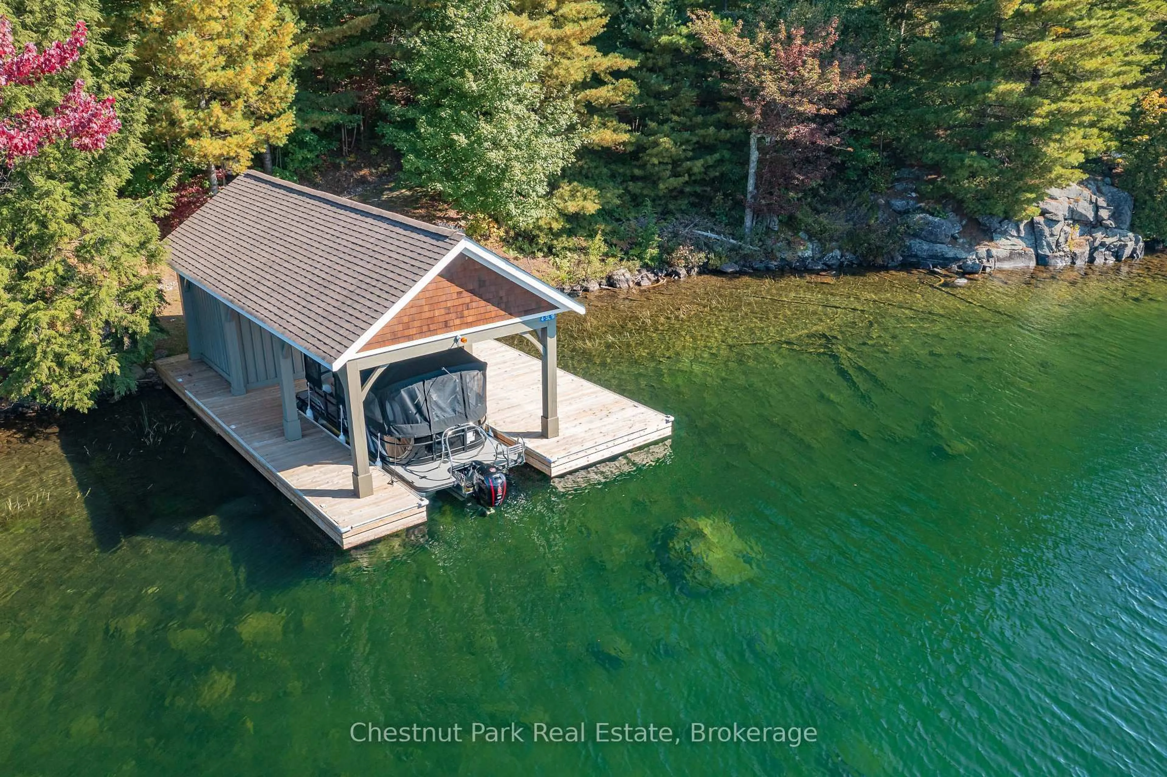 A pic from outside/outdoor area/front of a property/back of a property/a pic from drone, water/lake/river/ocean view for 4 SL 19 Roberts Island, Muskoka Lakes Ontario P0B 1M0